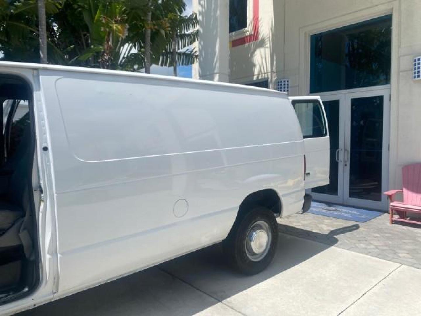 2006 Oxford White /Medium Flint Ford Econoline Cargo Van E350 LOW MILES 66,160 (1FTSE34L56D) with an 5.4L SOHC EFI V8 Triton Engine engine, Automatic transmission, located at 4701 North Dixie Hwy, Pompano Beach, FL, 33064, (954) 422-2889, 26.240938, -80.123474 - OUR WEBPAGE FLORIDACARS1.COM HAS OVER 100 PHOTOS AND FREE CARFAX LINK 2006 FORD E-SERIES E-350 SD CARGO VIN: 1FTSE34L56DB06011 1 F T S E 3 4 L 5 6 D B 0 6 0 1 1 VAN 5.4L V8 F GASOLINE REAR WHEEL DRIVE Top Features Vinyl Seats Basic Features ABS Brakes AM/FM Stereo Air Conditioning Automatic Transmis - Photo#14