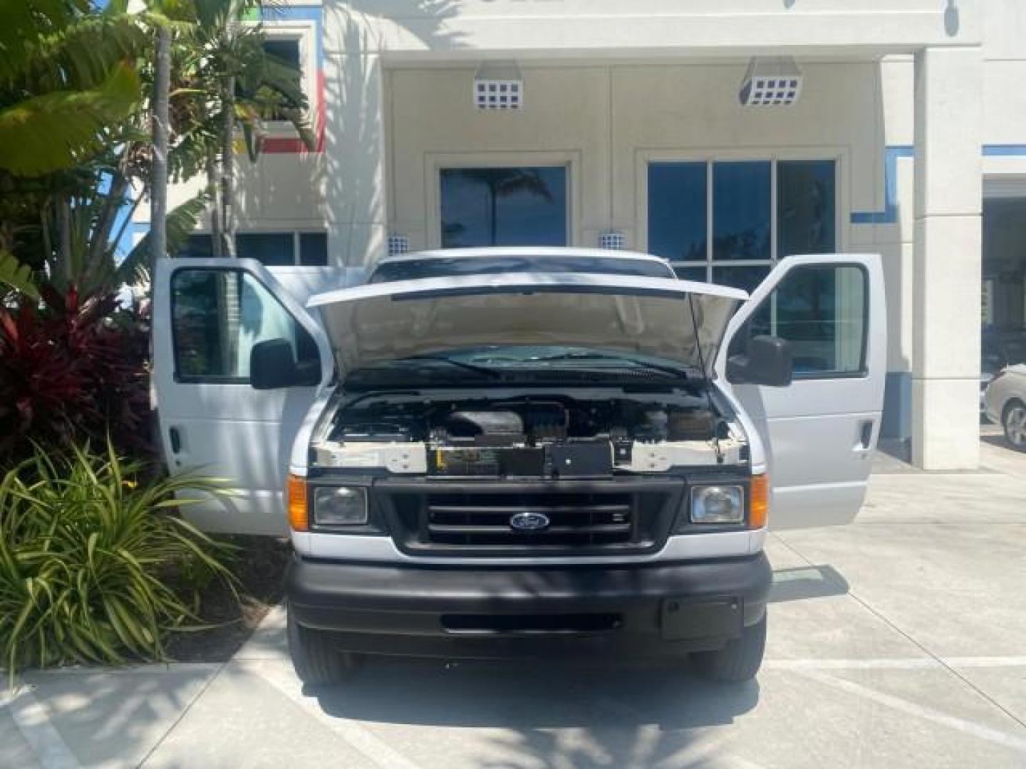 2006 Oxford White /Medium Flint Ford Econoline Cargo Van E350 LOW MILES 66,160 (1FTSE34L56D) with an 5.4L SOHC EFI V8 Triton Engine engine, Automatic transmission, located at 4701 North Dixie Hwy, Pompano Beach, FL, 33064, (954) 422-2889, 26.240938, -80.123474 - OUR WEBPAGE FLORIDACARS1.COM HAS OVER 100 PHOTOS AND FREE CARFAX LINK 2006 FORD E-SERIES E-350 SD CARGO VIN: 1FTSE34L56DB06011 1 F T S E 3 4 L 5 6 D B 0 6 0 1 1 VAN 5.4L V8 F GASOLINE REAR WHEEL DRIVE Top Features Vinyl Seats Basic Features ABS Brakes AM/FM Stereo Air Conditioning Automatic Transmis - Photo#16