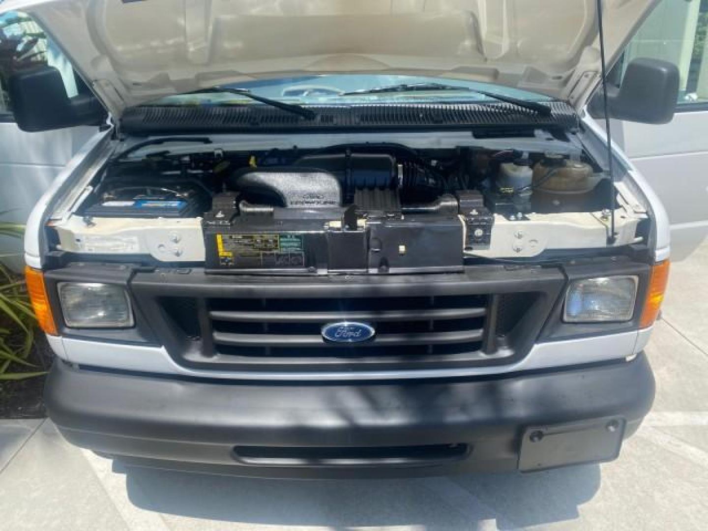 2006 Oxford White /Medium Flint Ford Econoline Cargo Van E350 LOW MILES 66,160 (1FTSE34L56D) with an 5.4L SOHC EFI V8 Triton Engine engine, Automatic transmission, located at 4701 North Dixie Hwy, Pompano Beach, FL, 33064, (954) 422-2889, 26.240938, -80.123474 - OUR WEBPAGE FLORIDACARS1.COM HAS OVER 100 PHOTOS AND FREE CARFAX LINK 2006 FORD E-SERIES E-350 SD CARGO VIN: 1FTSE34L56DB06011 1 F T S E 3 4 L 5 6 D B 0 6 0 1 1 VAN 5.4L V8 F GASOLINE REAR WHEEL DRIVE Top Features Vinyl Seats Basic Features ABS Brakes AM/FM Stereo Air Conditioning Automatic Transmis - Photo#17