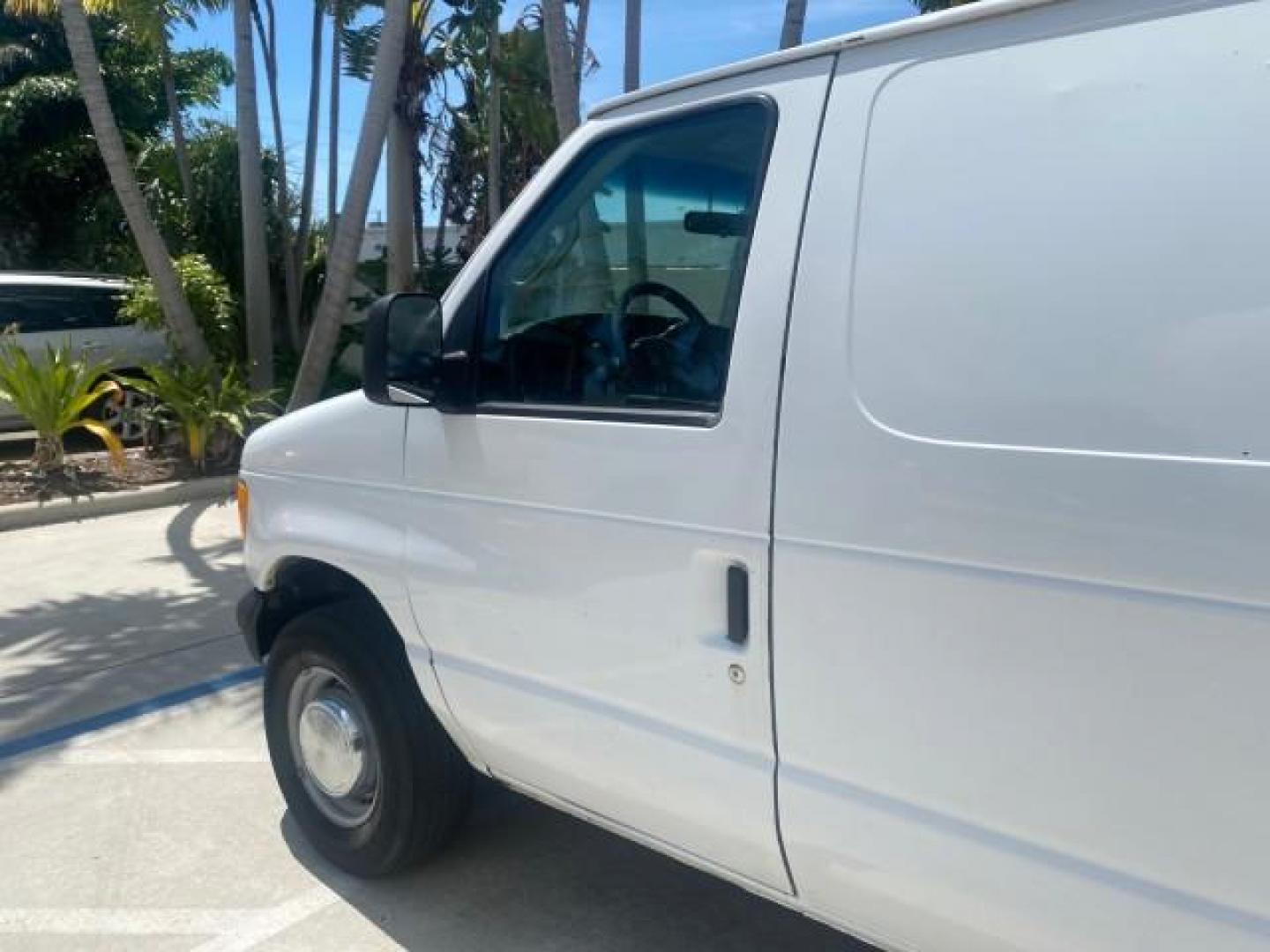2006 Oxford White /Medium Flint Ford Econoline Cargo Van E350 LOW MILES 66,160 (1FTSE34L56D) with an 5.4L SOHC EFI V8 Triton Engine engine, Automatic transmission, located at 4701 North Dixie Hwy, Pompano Beach, FL, 33064, (954) 422-2889, 26.240938, -80.123474 - OUR WEBPAGE FLORIDACARS1.COM HAS OVER 100 PHOTOS AND FREE CARFAX LINK 2006 FORD E-SERIES E-350 SD CARGO VIN: 1FTSE34L56DB06011 1 F T S E 3 4 L 5 6 D B 0 6 0 1 1 VAN 5.4L V8 F GASOLINE REAR WHEEL DRIVE Top Features Vinyl Seats Basic Features ABS Brakes AM/FM Stereo Air Conditioning Automatic Transmis - Photo#27