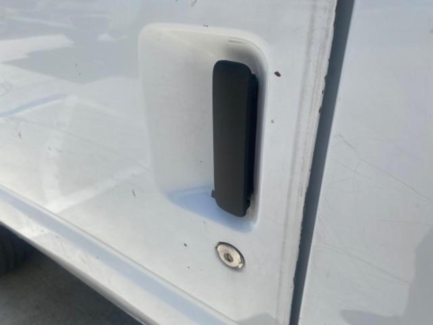 2006 Oxford White /Medium Flint Ford Econoline Cargo Van E350 LOW MILES 66,160 (1FTSE34L56D) with an 5.4L SOHC EFI V8 Triton Engine engine, Automatic transmission, located at 4701 North Dixie Hwy, Pompano Beach, FL, 33064, (954) 422-2889, 26.240938, -80.123474 - OUR WEBPAGE FLORIDACARS1.COM HAS OVER 100 PHOTOS AND FREE CARFAX LINK 2006 FORD E-SERIES E-350 SD CARGO VIN: 1FTSE34L56DB06011 1 F T S E 3 4 L 5 6 D B 0 6 0 1 1 VAN 5.4L V8 F GASOLINE REAR WHEEL DRIVE Top Features Vinyl Seats Basic Features ABS Brakes AM/FM Stereo Air Conditioning Automatic Transmis - Photo#28