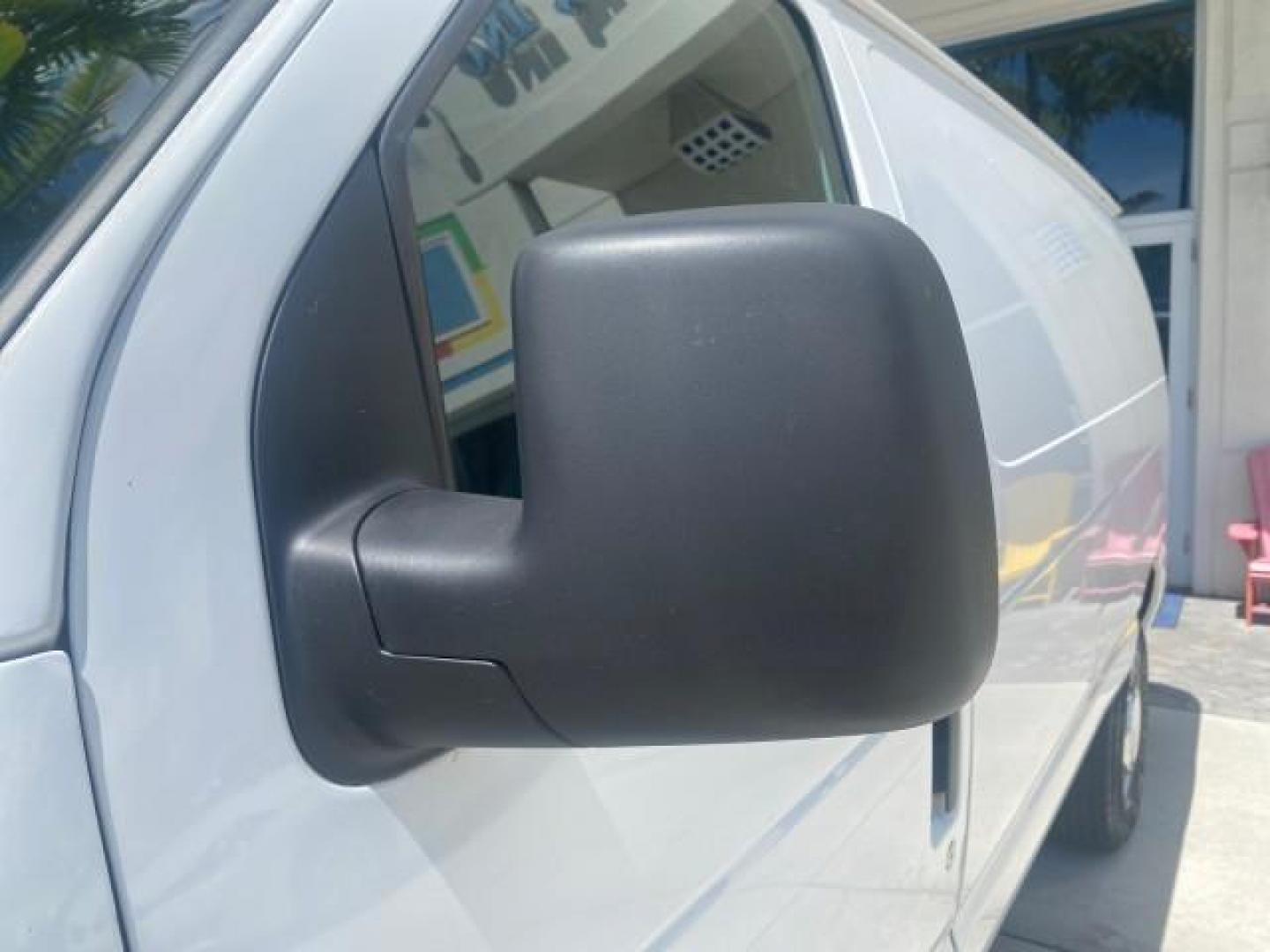 2006 Oxford White /Medium Flint Ford Econoline Cargo Van E350 LOW MILES 66,160 (1FTSE34L56D) with an 5.4L SOHC EFI V8 Triton Engine engine, Automatic transmission, located at 4701 North Dixie Hwy, Pompano Beach, FL, 33064, (954) 422-2889, 26.240938, -80.123474 - OUR WEBPAGE FLORIDACARS1.COM HAS OVER 100 PHOTOS AND FREE CARFAX LINK 2006 FORD E-SERIES E-350 SD CARGO VIN: 1FTSE34L56DB06011 1 F T S E 3 4 L 5 6 D B 0 6 0 1 1 VAN 5.4L V8 F GASOLINE REAR WHEEL DRIVE Top Features Vinyl Seats Basic Features ABS Brakes AM/FM Stereo Air Conditioning Automatic Transmis - Photo#31