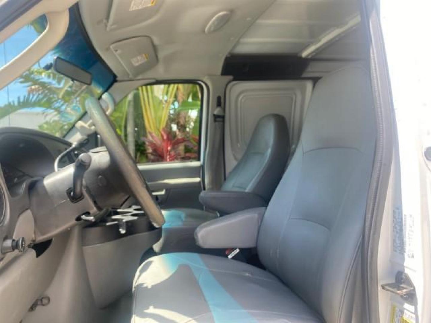 2006 Oxford White /Medium Flint Ford Econoline Cargo Van E350 LOW MILES 66,160 (1FTSE34L56D) with an 5.4L SOHC EFI V8 Triton Engine engine, Automatic transmission, located at 4701 North Dixie Hwy, Pompano Beach, FL, 33064, (954) 422-2889, 26.240938, -80.123474 - OUR WEBPAGE FLORIDACARS1.COM HAS OVER 100 PHOTOS AND FREE CARFAX LINK 2006 FORD E-SERIES E-350 SD CARGO VIN: 1FTSE34L56DB06011 1 F T S E 3 4 L 5 6 D B 0 6 0 1 1 VAN 5.4L V8 F GASOLINE REAR WHEEL DRIVE Top Features Vinyl Seats Basic Features ABS Brakes AM/FM Stereo Air Conditioning Automatic Transmis - Photo#32