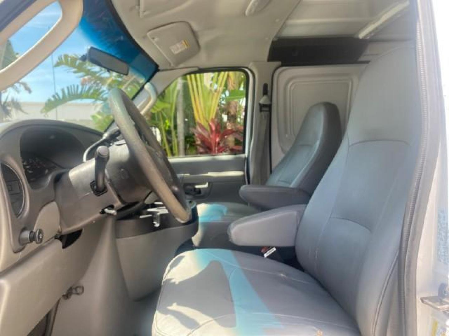 2006 Oxford White /Medium Flint Ford Econoline Cargo Van E350 LOW MILES 66,160 (1FTSE34L56D) with an 5.4L SOHC EFI V8 Triton Engine engine, Automatic transmission, located at 4701 North Dixie Hwy, Pompano Beach, FL, 33064, (954) 422-2889, 26.240938, -80.123474 - OUR WEBPAGE FLORIDACARS1.COM HAS OVER 100 PHOTOS AND FREE CARFAX LINK 2006 FORD E-SERIES E-350 SD CARGO VIN: 1FTSE34L56DB06011 1 F T S E 3 4 L 5 6 D B 0 6 0 1 1 VAN 5.4L V8 F GASOLINE REAR WHEEL DRIVE Top Features Vinyl Seats Basic Features ABS Brakes AM/FM Stereo Air Conditioning Automatic Transmis - Photo#33