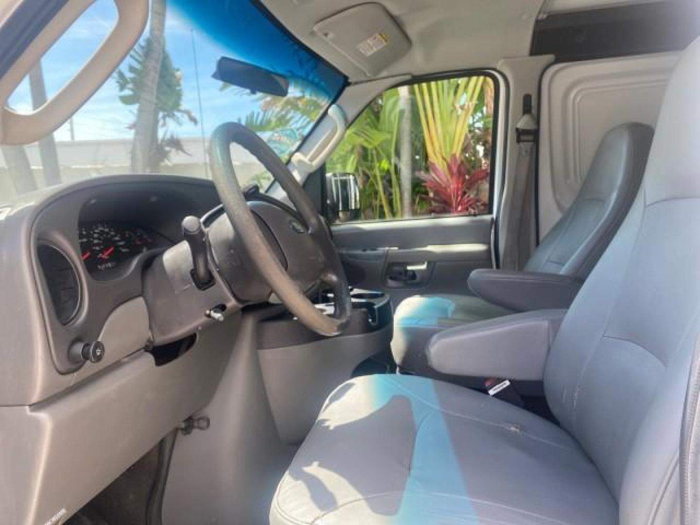 2006 Oxford White /Medium Flint Ford Econoline Cargo Van E350 LOW MILES 66,160 (1FTSE34L56D) with an 5.4L SOHC EFI V8 Triton Engine engine, Automatic transmission, located at 4701 North Dixie Hwy, Pompano Beach, FL, 33064, (954) 422-2889, 26.240938, -80.123474 - OUR WEBPAGE FLORIDACARS1.COM HAS OVER 100 PHOTOS AND FREE CARFAX LINK 2006 FORD E-SERIES E-350 SD CARGO VIN: 1FTSE34L56DB06011 1 F T S E 3 4 L 5 6 D B 0 6 0 1 1 VAN 5.4L V8 F GASOLINE REAR WHEEL DRIVE Top Features Vinyl Seats Basic Features ABS Brakes AM/FM Stereo Air Conditioning Automatic Transmis - Photo#34