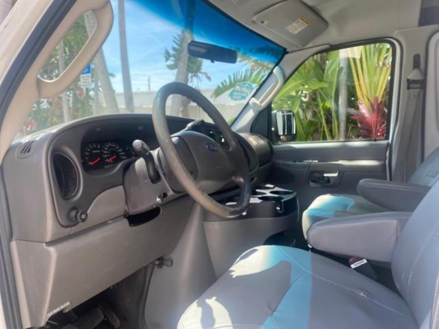 2006 Oxford White /Medium Flint Ford Econoline Cargo Van E350 LOW MILES 66,160 (1FTSE34L56D) with an 5.4L SOHC EFI V8 Triton Engine engine, Automatic transmission, located at 4701 North Dixie Hwy, Pompano Beach, FL, 33064, (954) 422-2889, 26.240938, -80.123474 - OUR WEBPAGE FLORIDACARS1.COM HAS OVER 100 PHOTOS AND FREE CARFAX LINK 2006 FORD E-SERIES E-350 SD CARGO VIN: 1FTSE34L56DB06011 1 F T S E 3 4 L 5 6 D B 0 6 0 1 1 VAN 5.4L V8 F GASOLINE REAR WHEEL DRIVE Top Features Vinyl Seats Basic Features ABS Brakes AM/FM Stereo Air Conditioning Automatic Transmis - Photo#35