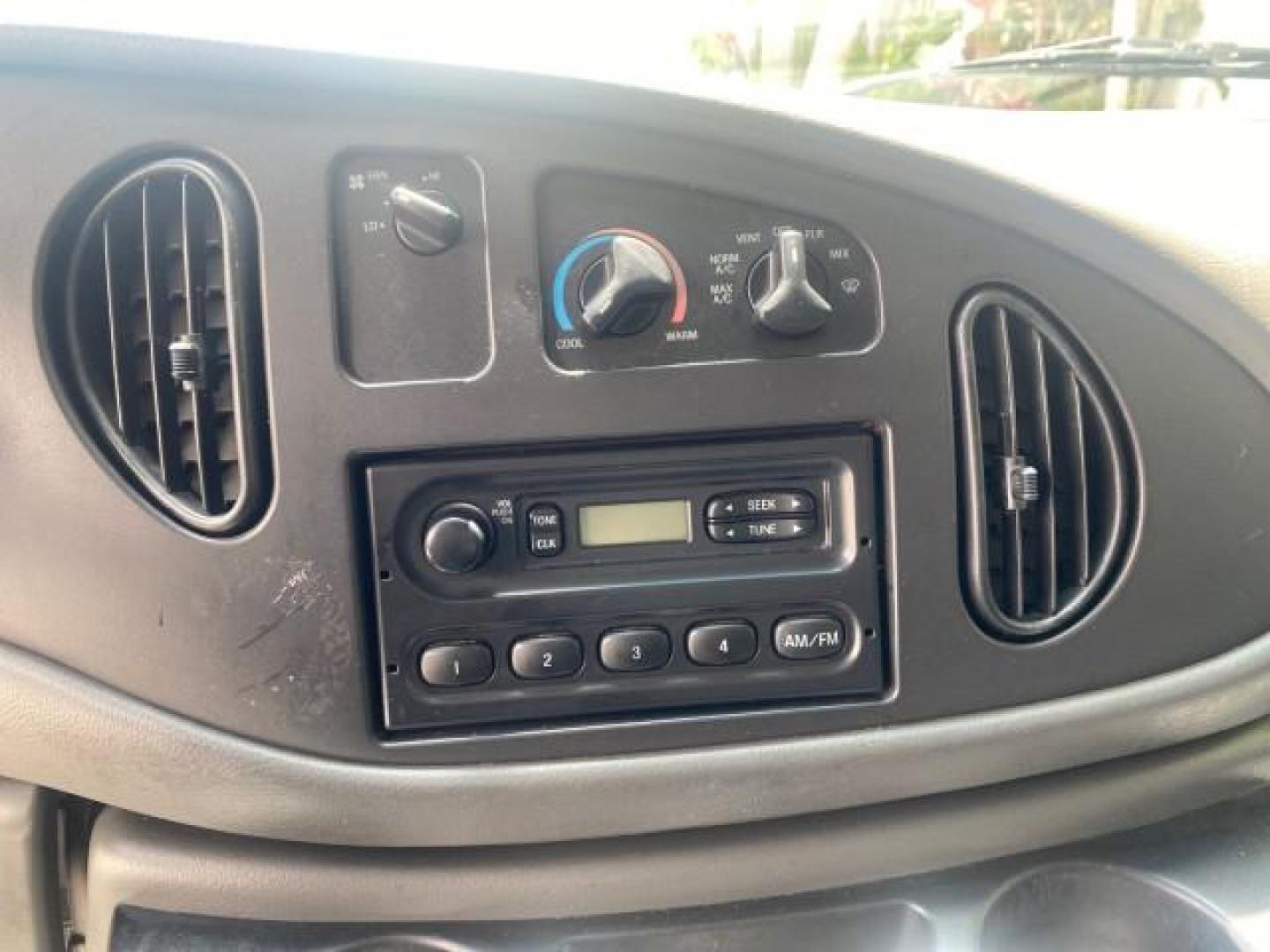 2006 Oxford White /Medium Flint Ford Econoline Cargo Van E350 LOW MILES 66,160 (1FTSE34L56D) with an 5.4L SOHC EFI V8 Triton Engine engine, Automatic transmission, located at 4701 North Dixie Hwy, Pompano Beach, FL, 33064, (954) 422-2889, 26.240938, -80.123474 - OUR WEBPAGE FLORIDACARS1.COM HAS OVER 100 PHOTOS AND FREE CARFAX LINK 2006 FORD E-SERIES E-350 SD CARGO VIN: 1FTSE34L56DB06011 1 F T S E 3 4 L 5 6 D B 0 6 0 1 1 VAN 5.4L V8 F GASOLINE REAR WHEEL DRIVE Top Features Vinyl Seats Basic Features ABS Brakes AM/FM Stereo Air Conditioning Automatic Transmis - Photo#46