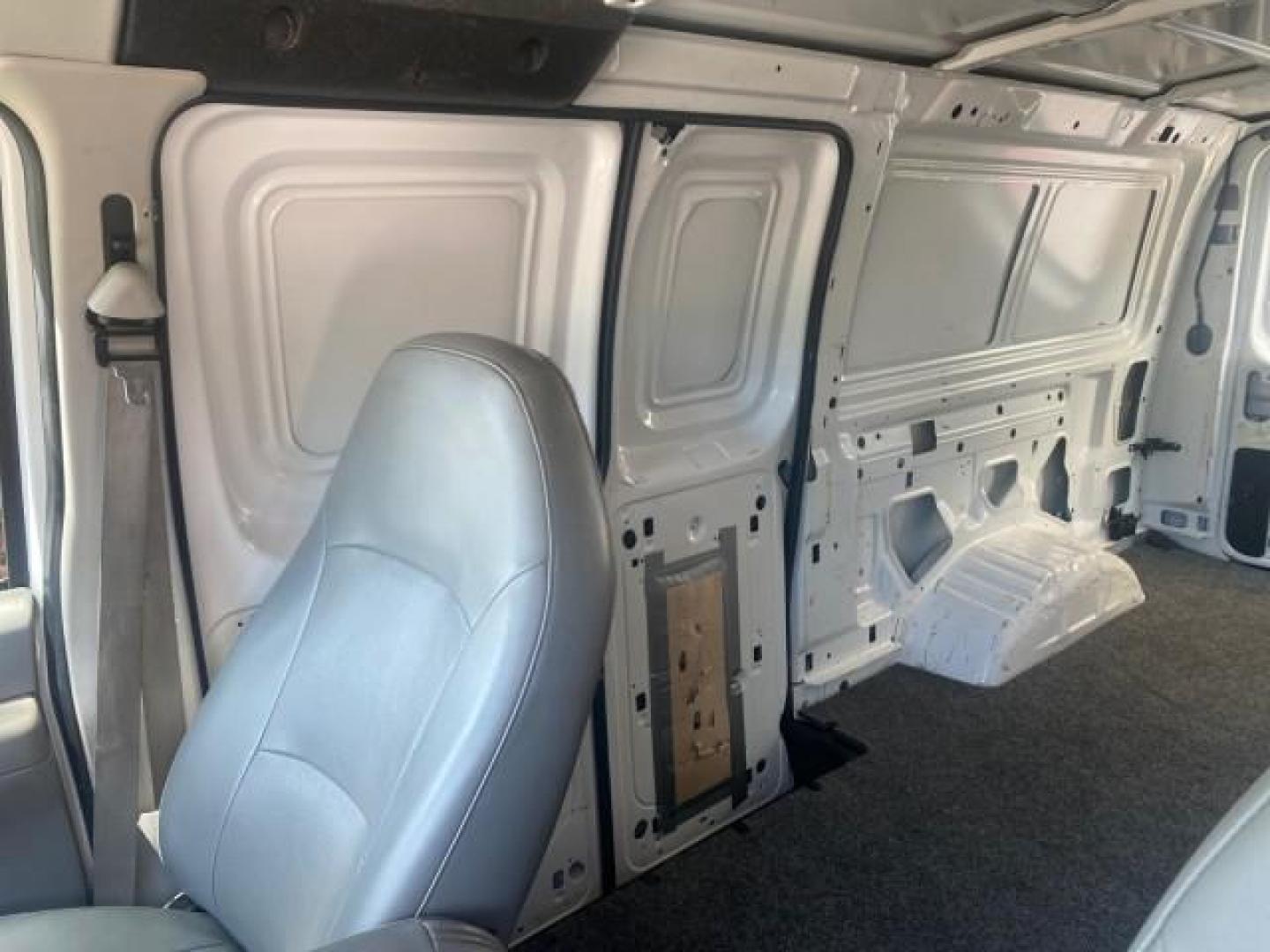 2006 Oxford White /Medium Flint Ford Econoline Cargo Van E350 LOW MILES 66,160 (1FTSE34L56D) with an 5.4L SOHC EFI V8 Triton Engine engine, Automatic transmission, located at 4701 North Dixie Hwy, Pompano Beach, FL, 33064, (954) 422-2889, 26.240938, -80.123474 - OUR WEBPAGE FLORIDACARS1.COM HAS OVER 100 PHOTOS AND FREE CARFAX LINK 2006 FORD E-SERIES E-350 SD CARGO VIN: 1FTSE34L56DB06011 1 F T S E 3 4 L 5 6 D B 0 6 0 1 1 VAN 5.4L V8 F GASOLINE REAR WHEEL DRIVE Top Features Vinyl Seats Basic Features ABS Brakes AM/FM Stereo Air Conditioning Automatic Transmis - Photo#57