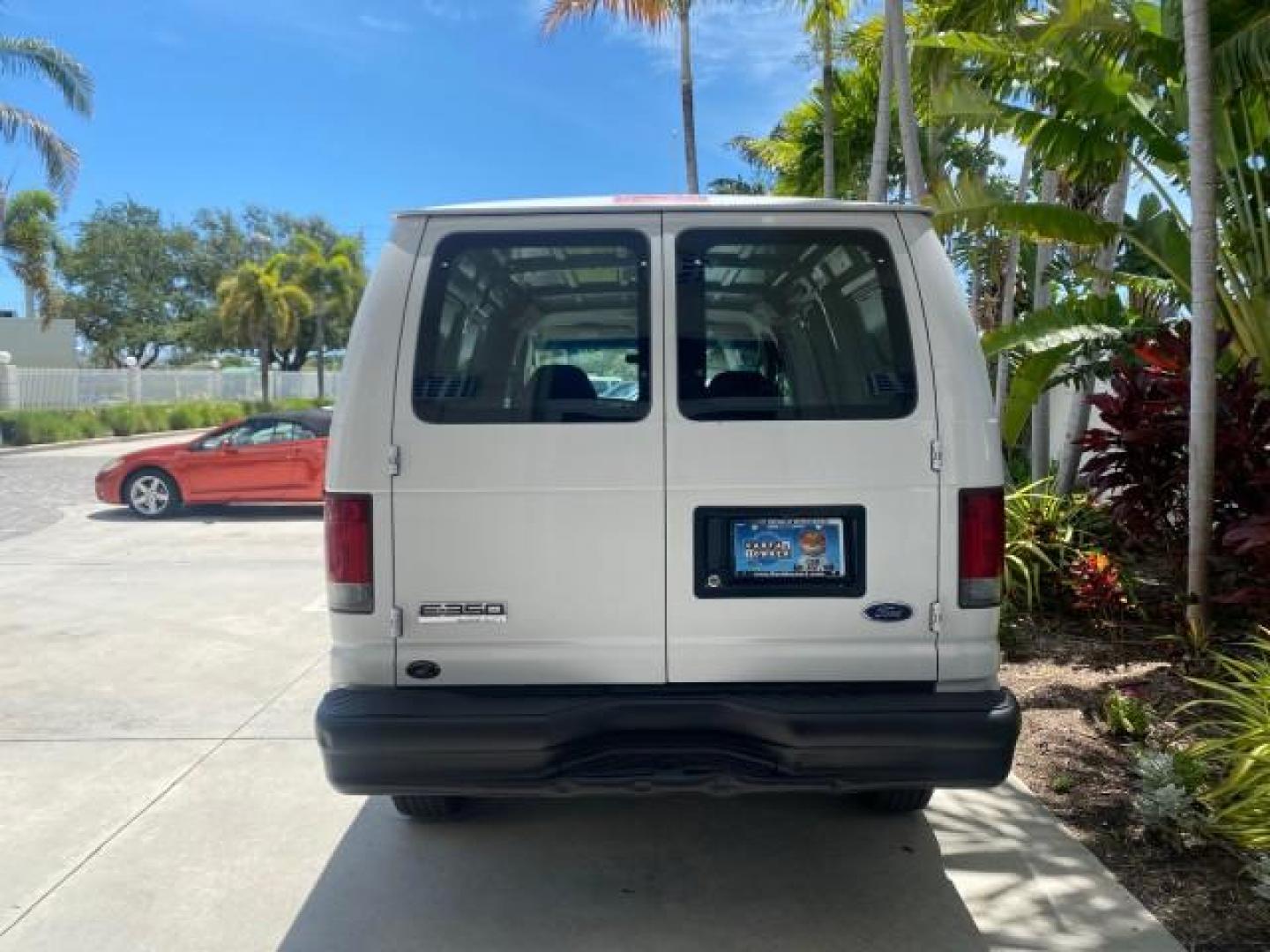 2006 Oxford White /Medium Flint Ford Econoline Cargo Van E350 LOW MILES 66,160 (1FTSE34L56D) with an 5.4L SOHC EFI V8 Triton Engine engine, Automatic transmission, located at 4701 North Dixie Hwy, Pompano Beach, FL, 33064, (954) 422-2889, 26.240938, -80.123474 - OUR WEBPAGE FLORIDACARS1.COM HAS OVER 100 PHOTOS AND FREE CARFAX LINK 2006 FORD E-SERIES E-350 SD CARGO VIN: 1FTSE34L56DB06011 1 F T S E 3 4 L 5 6 D B 0 6 0 1 1 VAN 5.4L V8 F GASOLINE REAR WHEEL DRIVE Top Features Vinyl Seats Basic Features ABS Brakes AM/FM Stereo Air Conditioning Automatic Transmis - Photo#69