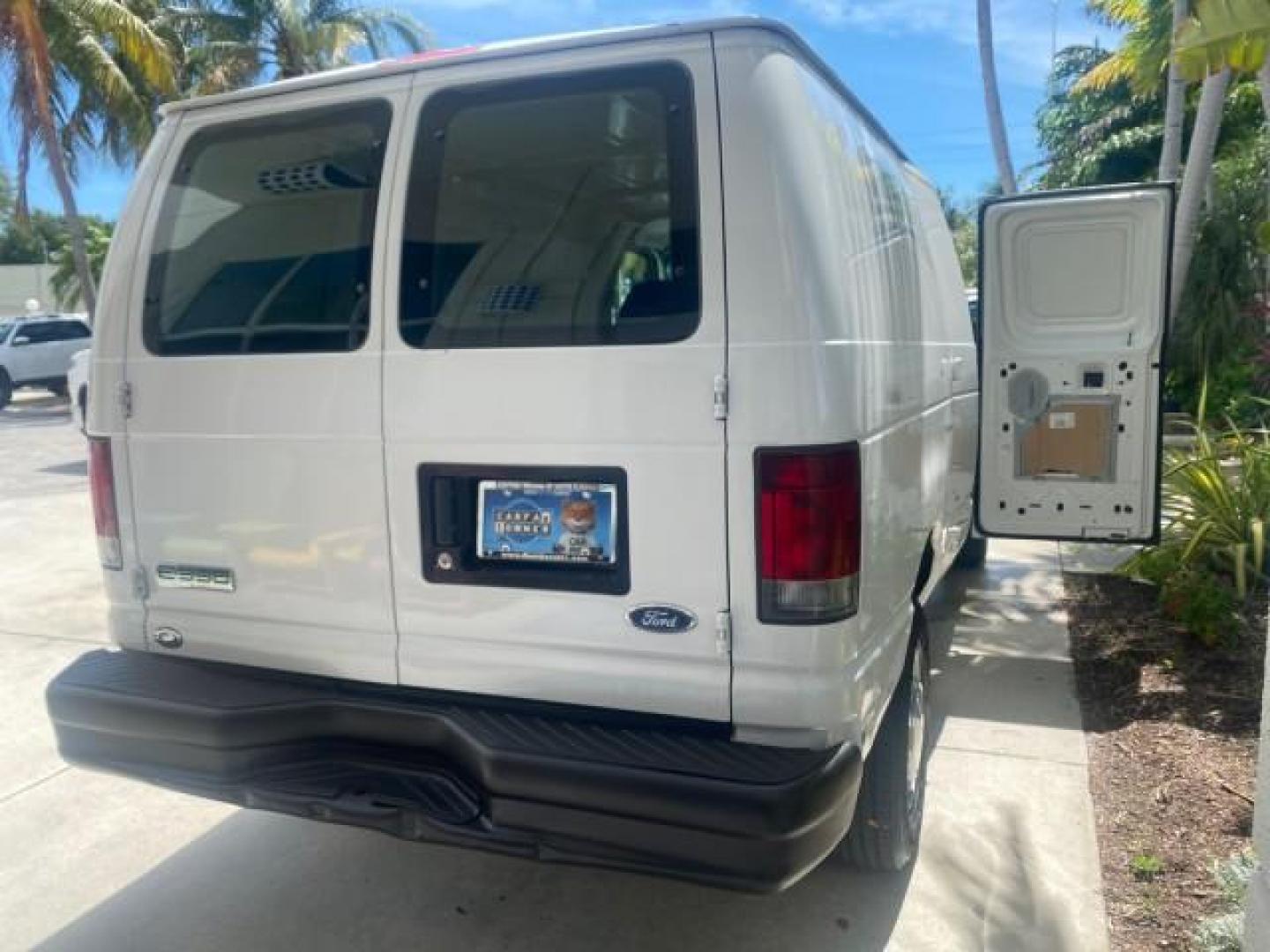 2006 Oxford White /Medium Flint Ford Econoline Cargo Van E350 LOW MILES 66,160 (1FTSE34L56D) with an 5.4L SOHC EFI V8 Triton Engine engine, Automatic transmission, located at 4701 North Dixie Hwy, Pompano Beach, FL, 33064, (954) 422-2889, 26.240938, -80.123474 - OUR WEBPAGE FLORIDACARS1.COM HAS OVER 100 PHOTOS AND FREE CARFAX LINK 2006 FORD E-SERIES E-350 SD CARGO VIN: 1FTSE34L56DB06011 1 F T S E 3 4 L 5 6 D B 0 6 0 1 1 VAN 5.4L V8 F GASOLINE REAR WHEEL DRIVE Top Features Vinyl Seats Basic Features ABS Brakes AM/FM Stereo Air Conditioning Automatic Transmis - Photo#70