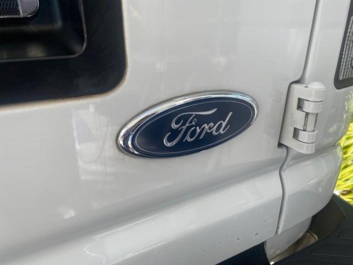 2006 Oxford White /Medium Flint Ford Econoline Cargo Van E350 LOW MILES 66,160 (1FTSE34L56D) with an 5.4L SOHC EFI V8 Triton Engine engine, Automatic transmission, located at 4701 North Dixie Hwy, Pompano Beach, FL, 33064, (954) 422-2889, 26.240938, -80.123474 - OUR WEBPAGE FLORIDACARS1.COM HAS OVER 100 PHOTOS AND FREE CARFAX LINK 2006 FORD E-SERIES E-350 SD CARGO VIN: 1FTSE34L56DB06011 1 F T S E 3 4 L 5 6 D B 0 6 0 1 1 VAN 5.4L V8 F GASOLINE REAR WHEEL DRIVE Top Features Vinyl Seats Basic Features ABS Brakes AM/FM Stereo Air Conditioning Automatic Transmis - Photo#72