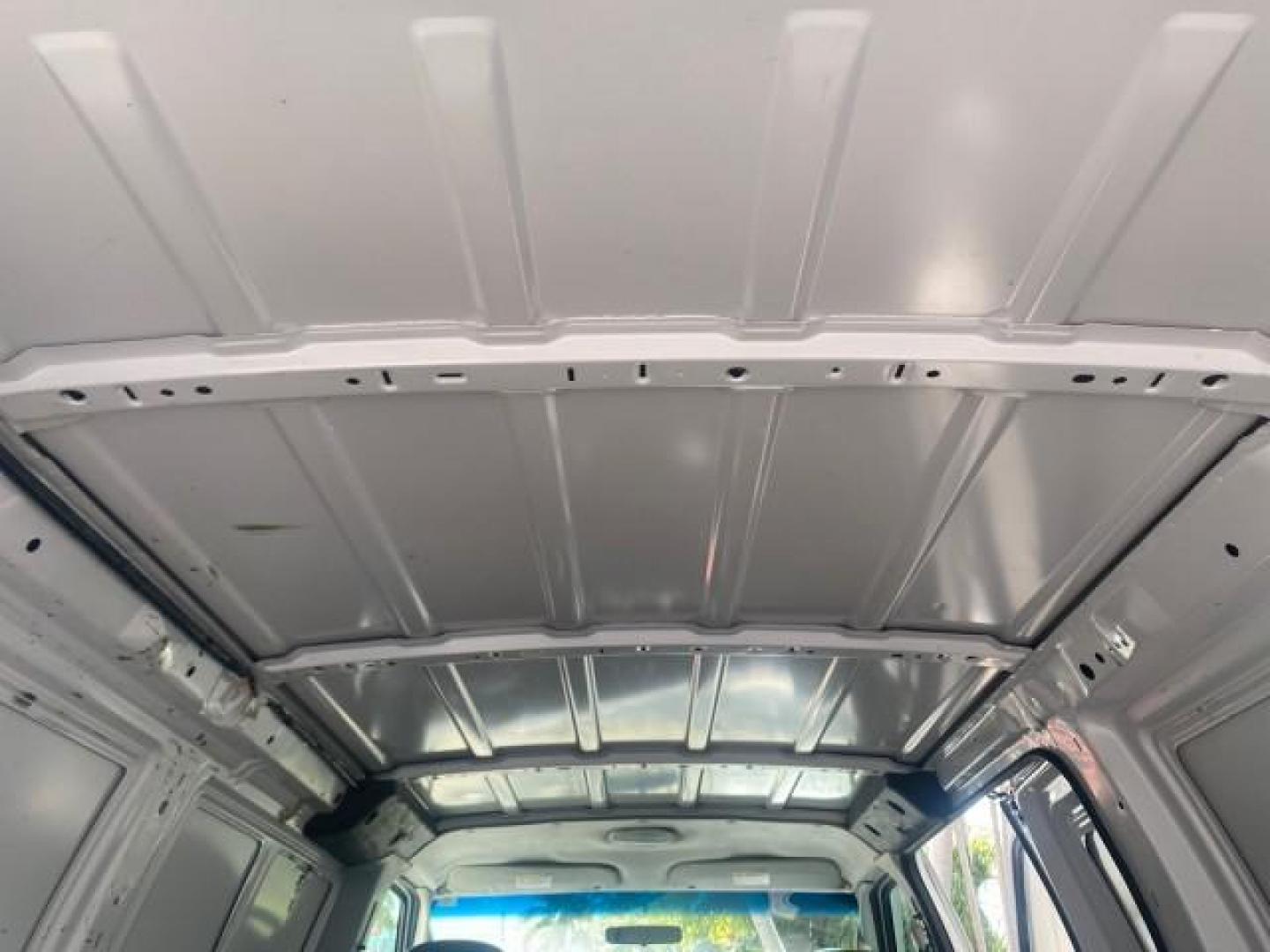 2006 Oxford White /Medium Flint Ford Econoline Cargo Van E350 LOW MILES 66,160 (1FTSE34L56D) with an 5.4L SOHC EFI V8 Triton Engine engine, Automatic transmission, located at 4701 North Dixie Hwy, Pompano Beach, FL, 33064, (954) 422-2889, 26.240938, -80.123474 - OUR WEBPAGE FLORIDACARS1.COM HAS OVER 100 PHOTOS AND FREE CARFAX LINK 2006 FORD E-SERIES E-350 SD CARGO VIN: 1FTSE34L56DB06011 1 F T S E 3 4 L 5 6 D B 0 6 0 1 1 VAN 5.4L V8 F GASOLINE REAR WHEEL DRIVE Top Features Vinyl Seats Basic Features ABS Brakes AM/FM Stereo Air Conditioning Automatic Transmis - Photo#81