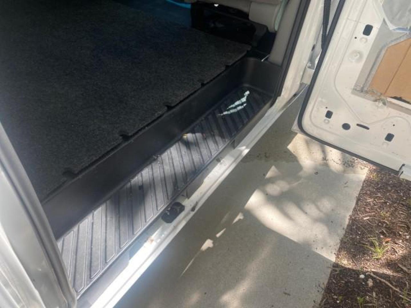 2006 Oxford White /Medium Flint Ford Econoline Cargo Van E350 LOW MILES 66,160 (1FTSE34L56D) with an 5.4L SOHC EFI V8 Triton Engine engine, Automatic transmission, located at 4701 North Dixie Hwy, Pompano Beach, FL, 33064, (954) 422-2889, 26.240938, -80.123474 - OUR WEBPAGE FLORIDACARS1.COM HAS OVER 100 PHOTOS AND FREE CARFAX LINK 2006 FORD E-SERIES E-350 SD CARGO VIN: 1FTSE34L56DB06011 1 F T S E 3 4 L 5 6 D B 0 6 0 1 1 VAN 5.4L V8 F GASOLINE REAR WHEEL DRIVE Top Features Vinyl Seats Basic Features ABS Brakes AM/FM Stereo Air Conditioning Automatic Transmis - Photo#88