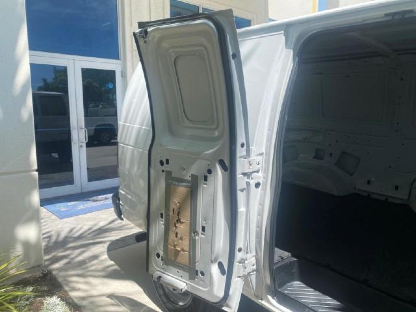 2006 Oxford White /Medium Flint Ford Econoline Cargo Van E350 LOW MILES 66,160 (1FTSE34L56D) with an 5.4L SOHC EFI V8 Triton Engine engine, Automatic transmission, located at 4701 North Dixie Hwy, Pompano Beach, FL, 33064, (954) 422-2889, 26.240938, -80.123474 - OUR WEBPAGE FLORIDACARS1.COM HAS OVER 100 PHOTOS AND FREE CARFAX LINK 2006 FORD E-SERIES E-350 SD CARGO VIN: 1FTSE34L56DB06011 1 F T S E 3 4 L 5 6 D B 0 6 0 1 1 VAN 5.4L V8 F GASOLINE REAR WHEEL DRIVE Top Features Vinyl Seats Basic Features ABS Brakes AM/FM Stereo Air Conditioning Automatic Transmis - Photo#90