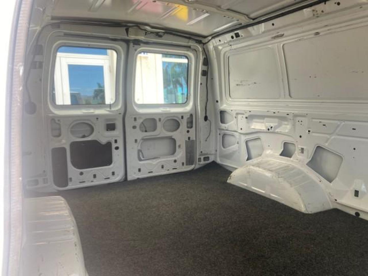 2006 Oxford White /Medium Flint Ford Econoline Cargo Van E350 LOW MILES 66,160 (1FTSE34L56D) with an 5.4L SOHC EFI V8 Triton Engine engine, Automatic transmission, located at 4701 North Dixie Hwy, Pompano Beach, FL, 33064, (954) 422-2889, 26.240938, -80.123474 - OUR WEBPAGE FLORIDACARS1.COM HAS OVER 100 PHOTOS AND FREE CARFAX LINK 2006 FORD E-SERIES E-350 SD CARGO VIN: 1FTSE34L56DB06011 1 F T S E 3 4 L 5 6 D B 0 6 0 1 1 VAN 5.4L V8 F GASOLINE REAR WHEEL DRIVE Top Features Vinyl Seats Basic Features ABS Brakes AM/FM Stereo Air Conditioning Automatic Transmis - Photo#92