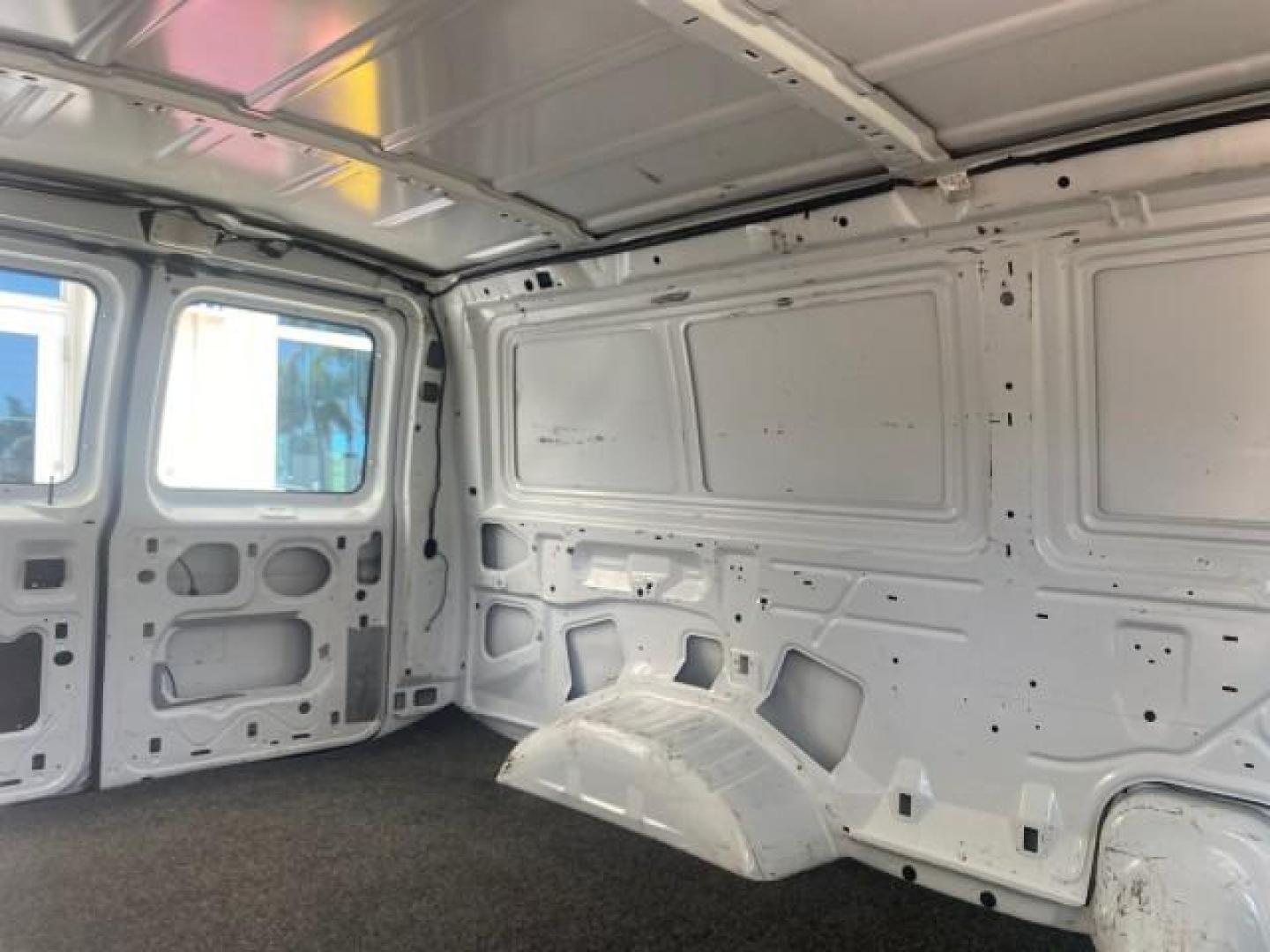 2006 Oxford White /Medium Flint Ford Econoline Cargo Van E350 LOW MILES 66,160 (1FTSE34L56D) with an 5.4L SOHC EFI V8 Triton Engine engine, Automatic transmission, located at 4701 North Dixie Hwy, Pompano Beach, FL, 33064, (954) 422-2889, 26.240938, -80.123474 - OUR WEBPAGE FLORIDACARS1.COM HAS OVER 100 PHOTOS AND FREE CARFAX LINK 2006 FORD E-SERIES E-350 SD CARGO VIN: 1FTSE34L56DB06011 1 F T S E 3 4 L 5 6 D B 0 6 0 1 1 VAN 5.4L V8 F GASOLINE REAR WHEEL DRIVE Top Features Vinyl Seats Basic Features ABS Brakes AM/FM Stereo Air Conditioning Automatic Transmis - Photo#93