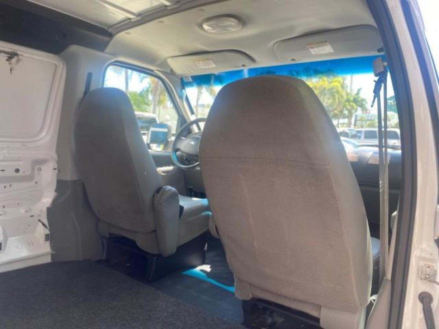 2006 Oxford White /Medium Flint Ford Econoline Cargo Van E350 LOW MILES 66,160 (1FTSE34L56D) with an 5.4L SOHC EFI V8 Triton Engine engine, Automatic transmission, located at 4701 North Dixie Hwy, Pompano Beach, FL, 33064, (954) 422-2889, 26.240938, -80.123474 - OUR WEBPAGE FLORIDACARS1.COM HAS OVER 100 PHOTOS AND FREE CARFAX LINK 2006 FORD E-SERIES E-350 SD CARGO VIN: 1FTSE34L56DB06011 1 F T S E 3 4 L 5 6 D B 0 6 0 1 1 VAN 5.4L V8 F GASOLINE REAR WHEEL DRIVE Top Features Vinyl Seats Basic Features ABS Brakes AM/FM Stereo Air Conditioning Automatic Transmis - Photo#95