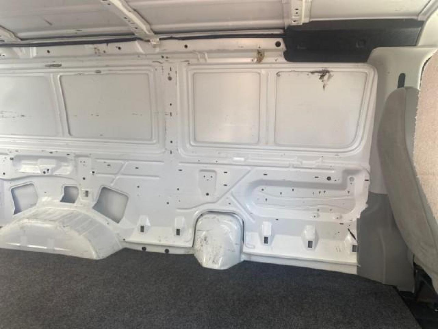 2006 Oxford White /Medium Flint Ford Econoline Cargo Van E350 LOW MILES 66,160 (1FTSE34L56D) with an 5.4L SOHC EFI V8 Triton Engine engine, Automatic transmission, located at 4701 North Dixie Hwy, Pompano Beach, FL, 33064, (954) 422-2889, 26.240938, -80.123474 - OUR WEBPAGE FLORIDACARS1.COM HAS OVER 100 PHOTOS AND FREE CARFAX LINK 2006 FORD E-SERIES E-350 SD CARGO VIN: 1FTSE34L56DB06011 1 F T S E 3 4 L 5 6 D B 0 6 0 1 1 VAN 5.4L V8 F GASOLINE REAR WHEEL DRIVE Top Features Vinyl Seats Basic Features ABS Brakes AM/FM Stereo Air Conditioning Automatic Transmis - Photo#98