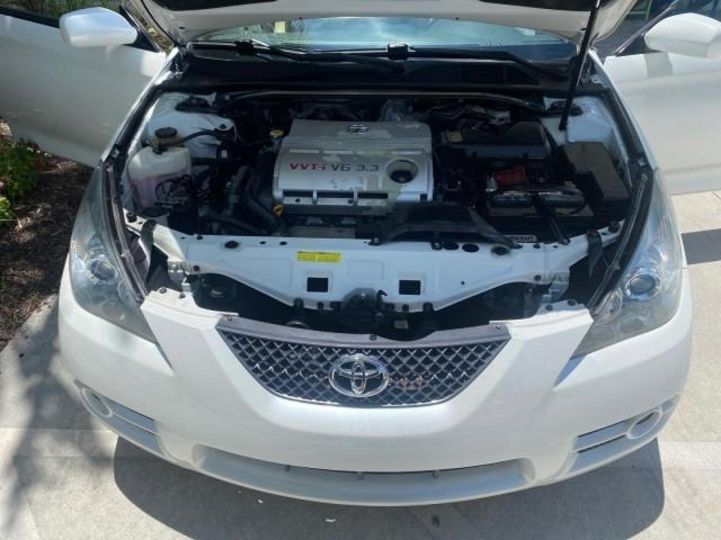 2008 Blizzard White Pearl /Ivory Toyota Camry Solara SLE LOW MILES 66,913 (4T1FA38P08U) with an 3.3L DOHC SMPI VVT-i 24-Valve V6 Engine engine, Automatic transmission, located at 4701 North Dixie Hwy, Pompano Beach, FL, 33064, (954) 422-2889, 26.240938, -80.123474 - OUR WEBPAGE FLORIDACARS1.COM HAS OVER 100 PHOTOS AND FREE CARFAX LINK 2008 TOYOTA CAMRY SOLARA SLE V6 PEARL WHITE IMMACULATE NONSMOKERS VIN: 4T1FA38P08U152807 4 T 1 F A 3 8 P 0 8 U 1 5 2 8 0 7 CONVERTIBLE 3.3L V6 F DOHC 24V 29MPG GASOLINE FRONT WHEEL DRIVE THE DASH HAS NO CRACKS LOOKS ALL ORIGINAL! - Photo#17