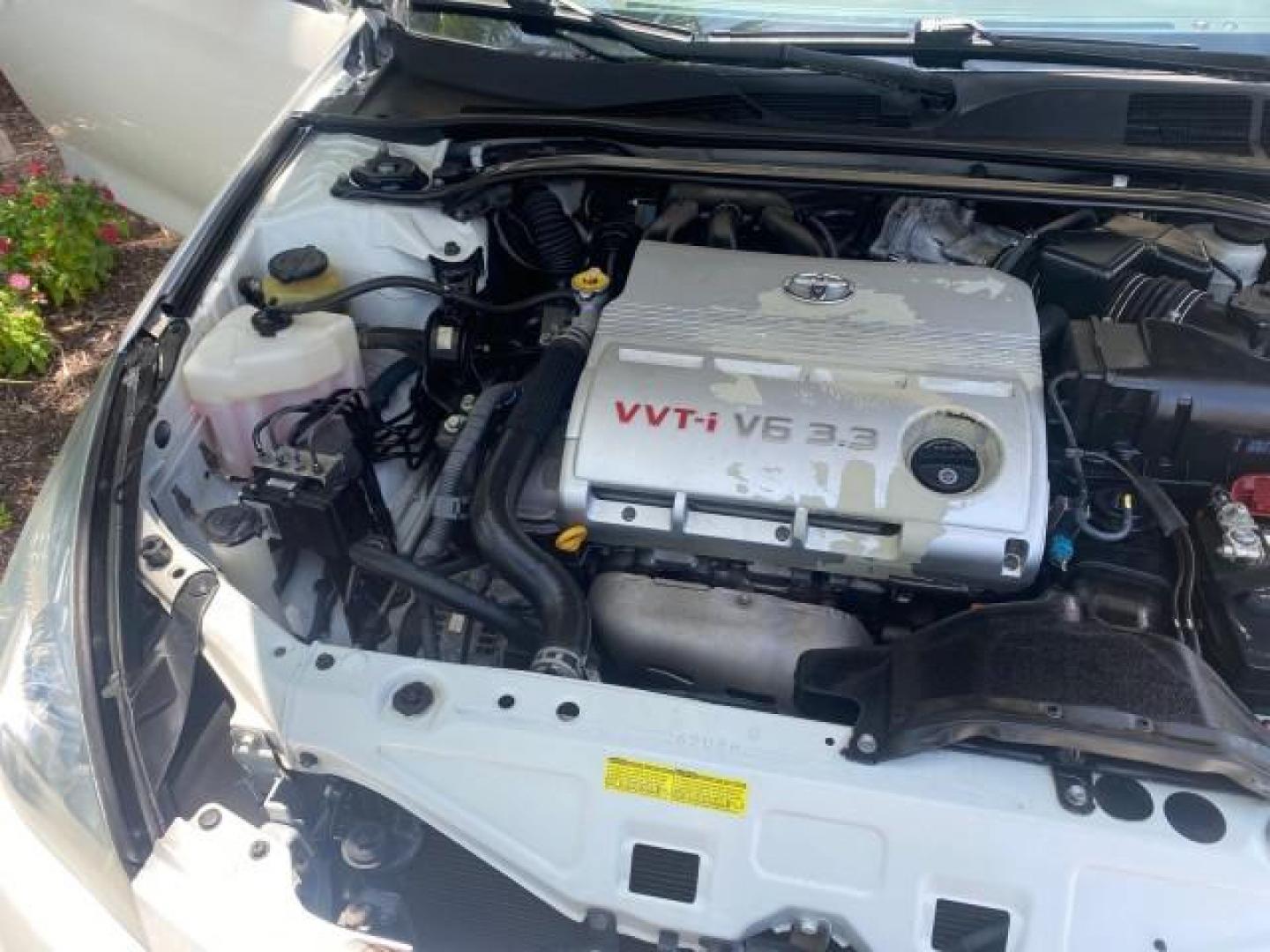 2008 Blizzard White Pearl /Ivory Toyota Camry Solara SLE LOW MILES 66,913 (4T1FA38P08U) with an 3.3L DOHC SMPI VVT-i 24-Valve V6 Engine engine, Automatic transmission, located at 4701 North Dixie Hwy, Pompano Beach, FL, 33064, (954) 422-2889, 26.240938, -80.123474 - OUR WEBPAGE FLORIDACARS1.COM HAS OVER 100 PHOTOS AND FREE CARFAX LINK 2008 TOYOTA CAMRY SOLARA SLE V6 PEARL WHITE IMMACULATE NONSMOKERS VIN: 4T1FA38P08U152807 4 T 1 F A 3 8 P 0 8 U 1 5 2 8 0 7 CONVERTIBLE 3.3L V6 F DOHC 24V 29MPG GASOLINE FRONT WHEEL DRIVE THE DASH HAS NO CRACKS LOOKS ALL ORIGINAL! - Photo#25