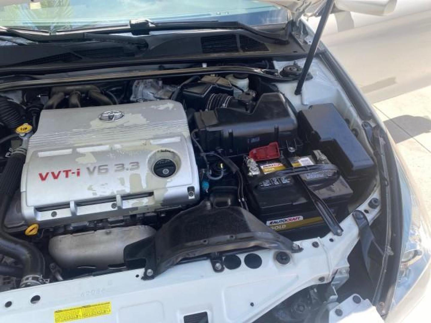 2008 Blizzard White Pearl /Ivory Toyota Camry Solara SLE LOW MILES 66,913 (4T1FA38P08U) with an 3.3L DOHC SMPI VVT-i 24-Valve V6 Engine engine, Automatic transmission, located at 4701 North Dixie Hwy, Pompano Beach, FL, 33064, (954) 422-2889, 26.240938, -80.123474 - OUR WEBPAGE FLORIDACARS1.COM HAS OVER 100 PHOTOS AND FREE CARFAX LINK 2008 TOYOTA CAMRY SOLARA SLE V6 PEARL WHITE IMMACULATE NONSMOKERS VIN: 4T1FA38P08U152807 4 T 1 F A 3 8 P 0 8 U 1 5 2 8 0 7 CONVERTIBLE 3.3L V6 F DOHC 24V 29MPG GASOLINE FRONT WHEEL DRIVE THE DASH HAS NO CRACKS LOOKS ALL ORIGINAL! - Photo#26