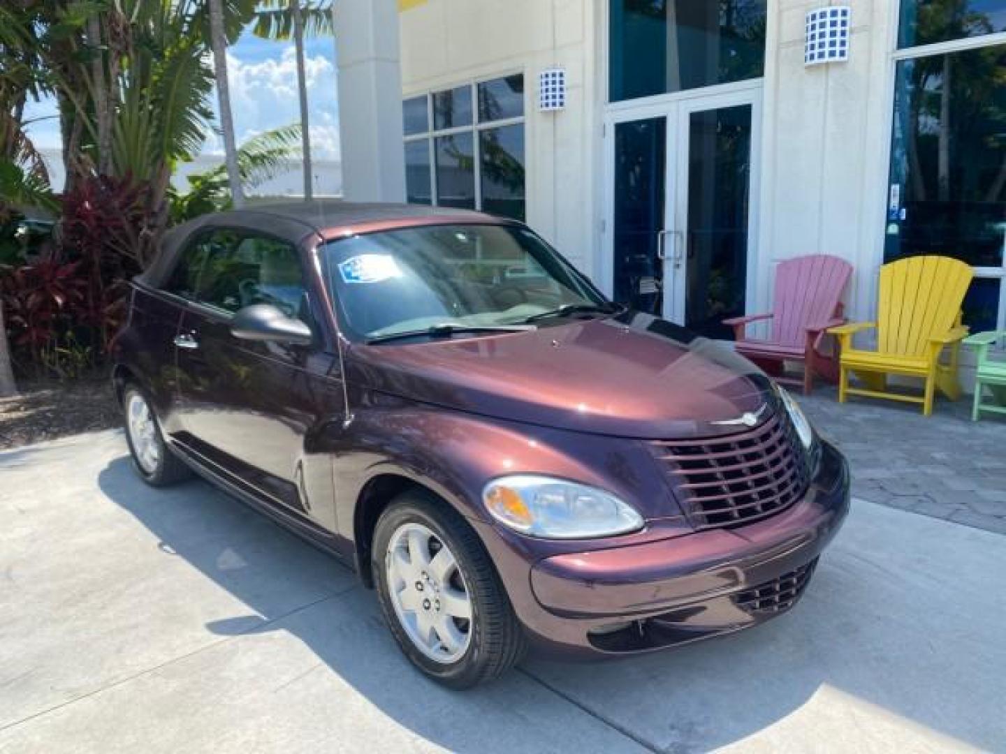 2005 Dark Plum Pearl /Taupe/Pearl Beige Chrysler PT Cruiser TURBO CONV LOW MILES 28,028 (3C3AY55E65T) with an 2.4L DOHC 16-Valve Turbo I4 Engine engine, Automatic transmission, located at 4701 North Dixie Hwy, Pompano Beach, FL, 33064, (954) 422-2889, 26.240938, -80.123474 - OUR WEBPAGE FLORIDACARS1.COM HAS OVER 100 PHOTOS AND FREE CARFAX LINK 2005 CHRYSLER PT CRUISER TOURING LEATHER LOADED VERY NICE NONSMOKER VIN: 3C3AY55E65T518675 3 C 3 A Y 5 5 E 6 5 T 5 1 8 6 7 5 CONVERTIBLE 2.4L I4 F DOHC 16V GASOLINE FRONT WHEEL DRIVE Top Features Alloy Wheels Leather Seats Satelli - Photo#1