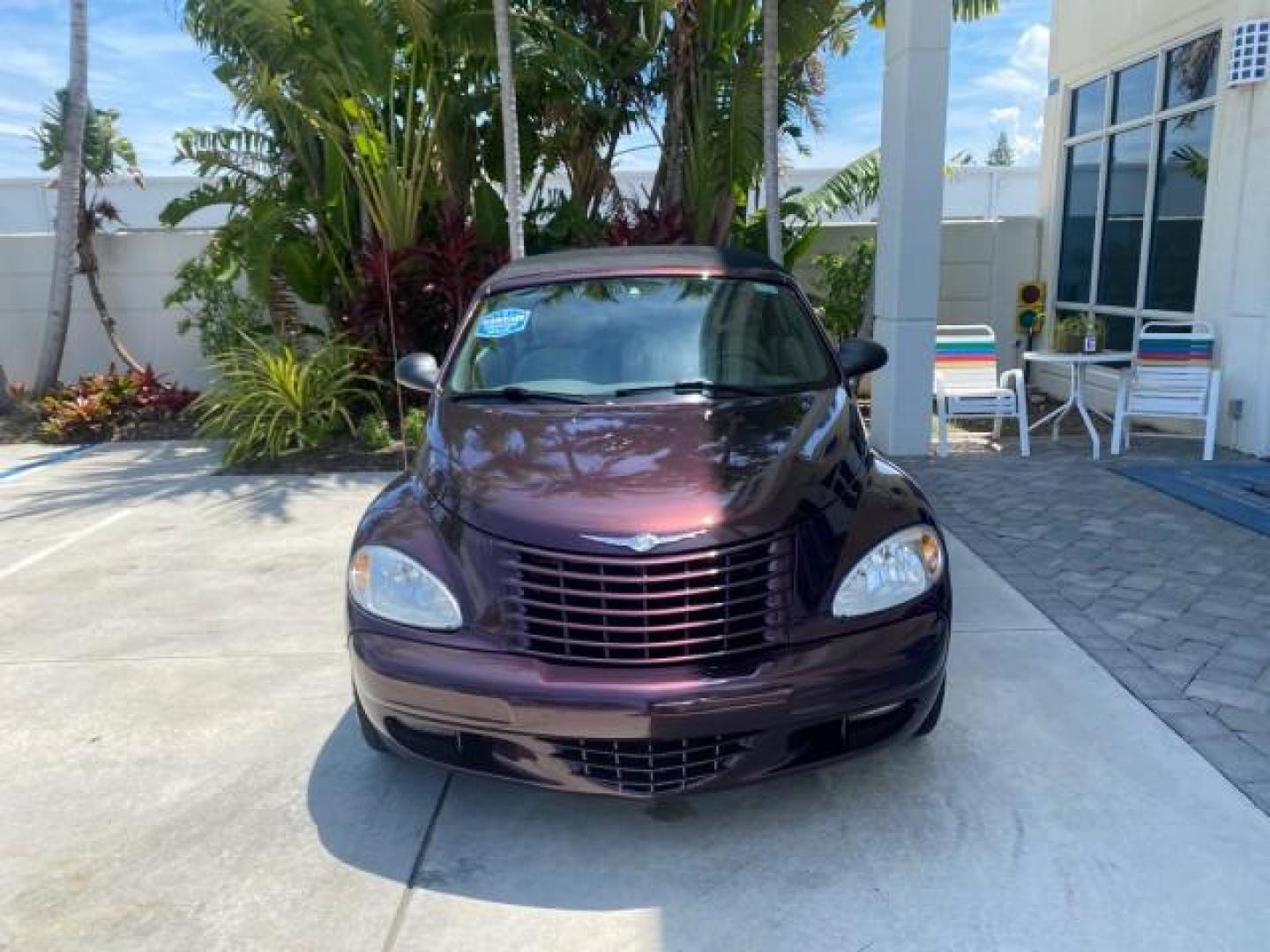 2005 Dark Plum Pearl /Taupe/Pearl Beige Chrysler PT Cruiser TURBO CONV LOW MILES 28,028 (3C3AY55E65T) with an 2.4L DOHC 16-Valve Turbo I4 Engine engine, Automatic transmission, located at 4701 North Dixie Hwy, Pompano Beach, FL, 33064, (954) 422-2889, 26.240938, -80.123474 - OUR WEBPAGE FLORIDACARS1.COM HAS OVER 100 PHOTOS AND FREE CARFAX LINK 2005 CHRYSLER PT CRUISER TOURING LEATHER LOADED VERY NICE NONSMOKER VIN: 3C3AY55E65T518675 3 C 3 A Y 5 5 E 6 5 T 5 1 8 6 7 5 CONVERTIBLE 2.4L I4 F DOHC 16V GASOLINE FRONT WHEEL DRIVE Top Features Alloy Wheels Leather Seats Satelli - Photo#2
