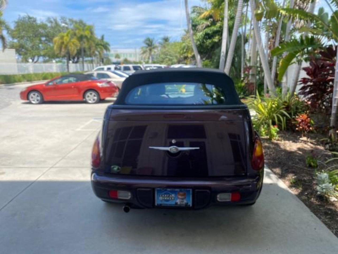 2005 Dark Plum Pearl /Taupe/Pearl Beige Chrysler PT Cruiser TURBO CONV LOW MILES 28,028 (3C3AY55E65T) with an 2.4L DOHC 16-Valve Turbo I4 Engine engine, Automatic transmission, located at 4701 North Dixie Hwy, Pompano Beach, FL, 33064, (954) 422-2889, 26.240938, -80.123474 - OUR WEBPAGE FLORIDACARS1.COM HAS OVER 100 PHOTOS AND FREE CARFAX LINK 2005 CHRYSLER PT CRUISER TOURING LEATHER LOADED VERY NICE NONSMOKER VIN: 3C3AY55E65T518675 3 C 3 A Y 5 5 E 6 5 T 5 1 8 6 7 5 CONVERTIBLE 2.4L I4 F DOHC 16V GASOLINE FRONT WHEEL DRIVE Top Features Alloy Wheels Leather Seats Satelli - Photo#6