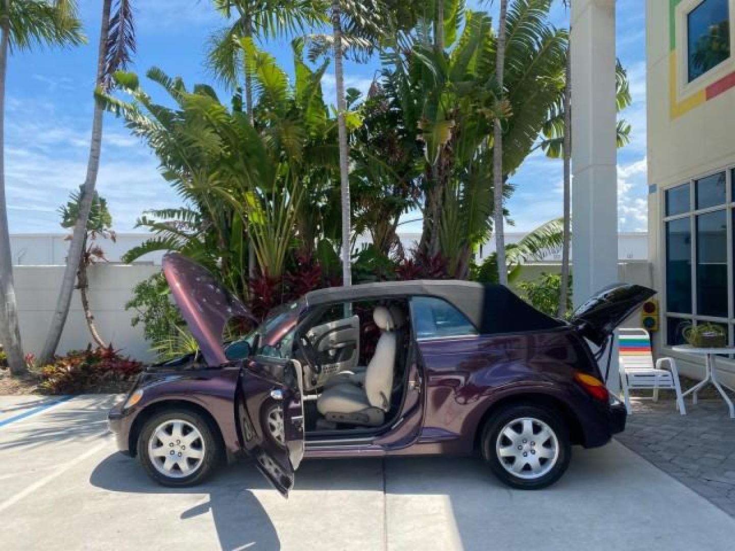 2005 Dark Plum Pearl /Taupe/Pearl Beige Chrysler PT Cruiser TURBO CONV LOW MILES 28,028 (3C3AY55E65T) with an 2.4L DOHC 16-Valve Turbo I4 Engine engine, Automatic transmission, located at 4701 North Dixie Hwy, Pompano Beach, FL, 33064, (954) 422-2889, 26.240938, -80.123474 - OUR WEBPAGE FLORIDACARS1.COM HAS OVER 100 PHOTOS AND FREE CARFAX LINK 2005 CHRYSLER PT CRUISER TOURING LEATHER LOADED VERY NICE NONSMOKER VIN: 3C3AY55E65T518675 3 C 3 A Y 5 5 E 6 5 T 5 1 8 6 7 5 CONVERTIBLE 2.4L I4 F DOHC 16V GASOLINE FRONT WHEEL DRIVE Top Features Alloy Wheels Leather Seats Satelli - Photo#8