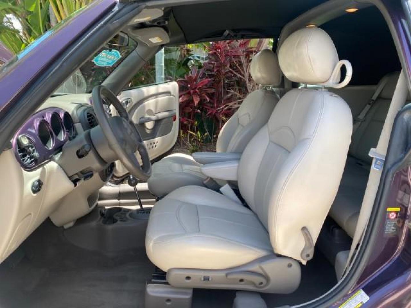 2005 Dark Plum Pearl /Taupe/Pearl Beige Chrysler PT Cruiser TURBO CONV LOW MILES 28,028 (3C3AY55E65T) with an 2.4L DOHC 16-Valve Turbo I4 Engine engine, Automatic transmission, located at 4701 North Dixie Hwy, Pompano Beach, FL, 33064, (954) 422-2889, 26.240938, -80.123474 - OUR WEBPAGE FLORIDACARS1.COM HAS OVER 100 PHOTOS AND FREE CARFAX LINK 2005 CHRYSLER PT CRUISER TOURING LEATHER LOADED VERY NICE NONSMOKER VIN: 3C3AY55E65T518675 3 C 3 A Y 5 5 E 6 5 T 5 1 8 6 7 5 CONVERTIBLE 2.4L I4 F DOHC 16V GASOLINE FRONT WHEEL DRIVE Top Features Alloy Wheels Leather Seats Satelli - Photo#10