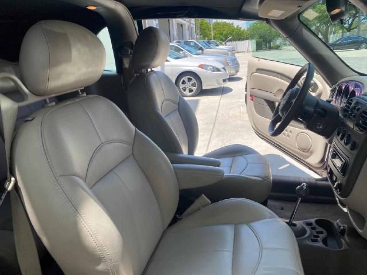 2005 Dark Plum Pearl /Taupe/Pearl Beige Chrysler PT Cruiser TURBO CONV LOW MILES 28,028 (3C3AY55E65T) with an 2.4L DOHC 16-Valve Turbo I4 Engine engine, Automatic transmission, located at 4701 North Dixie Hwy, Pompano Beach, FL, 33064, (954) 422-2889, 26.240938, -80.123474 - OUR WEBPAGE FLORIDACARS1.COM HAS OVER 100 PHOTOS AND FREE CARFAX LINK 2005 CHRYSLER PT CRUISER TOURING LEATHER LOADED VERY NICE NONSMOKER VIN: 3C3AY55E65T518675 3 C 3 A Y 5 5 E 6 5 T 5 1 8 6 7 5 CONVERTIBLE 2.4L I4 F DOHC 16V GASOLINE FRONT WHEEL DRIVE Top Features Alloy Wheels Leather Seats Satelli - Photo#12