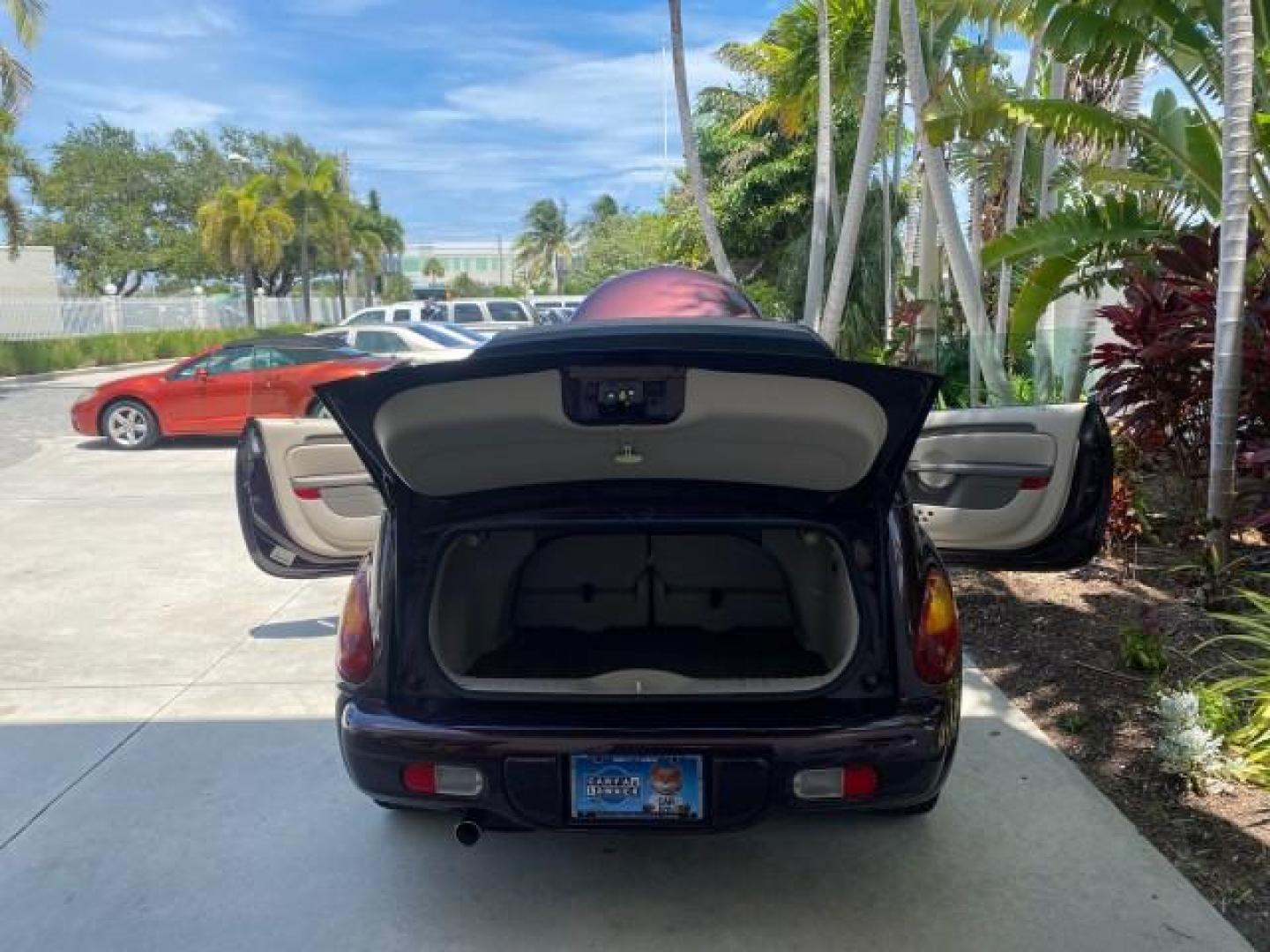 2005 Dark Plum Pearl /Taupe/Pearl Beige Chrysler PT Cruiser TURBO CONV LOW MILES 28,028 (3C3AY55E65T) with an 2.4L DOHC 16-Valve Turbo I4 Engine engine, Automatic transmission, located at 4701 North Dixie Hwy, Pompano Beach, FL, 33064, (954) 422-2889, 26.240938, -80.123474 - OUR WEBPAGE FLORIDACARS1.COM HAS OVER 100 PHOTOS AND FREE CARFAX LINK 2005 CHRYSLER PT CRUISER TOURING LEATHER LOADED VERY NICE NONSMOKER VIN: 3C3AY55E65T518675 3 C 3 A Y 5 5 E 6 5 T 5 1 8 6 7 5 CONVERTIBLE 2.4L I4 F DOHC 16V GASOLINE FRONT WHEEL DRIVE Top Features Alloy Wheels Leather Seats Satelli - Photo#15