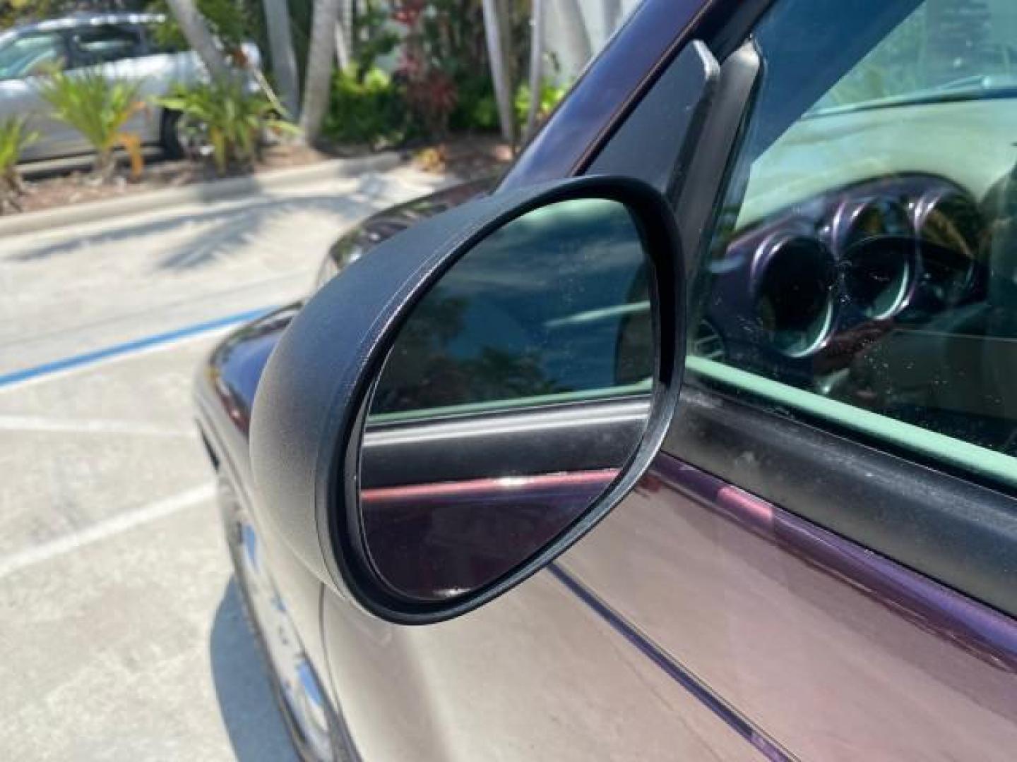 2005 Dark Plum Pearl /Taupe/Pearl Beige Chrysler PT Cruiser TURBO CONV LOW MILES 28,028 (3C3AY55E65T) with an 2.4L DOHC 16-Valve Turbo I4 Engine engine, Automatic transmission, located at 4701 North Dixie Hwy, Pompano Beach, FL, 33064, (954) 422-2889, 26.240938, -80.123474 - OUR WEBPAGE FLORIDACARS1.COM HAS OVER 100 PHOTOS AND FREE CARFAX LINK 2005 CHRYSLER PT CRUISER TOURING LEATHER LOADED VERY NICE NONSMOKER VIN: 3C3AY55E65T518675 3 C 3 A Y 5 5 E 6 5 T 5 1 8 6 7 5 CONVERTIBLE 2.4L I4 F DOHC 16V GASOLINE FRONT WHEEL DRIVE Top Features Alloy Wheels Leather Seats Satelli - Photo#29