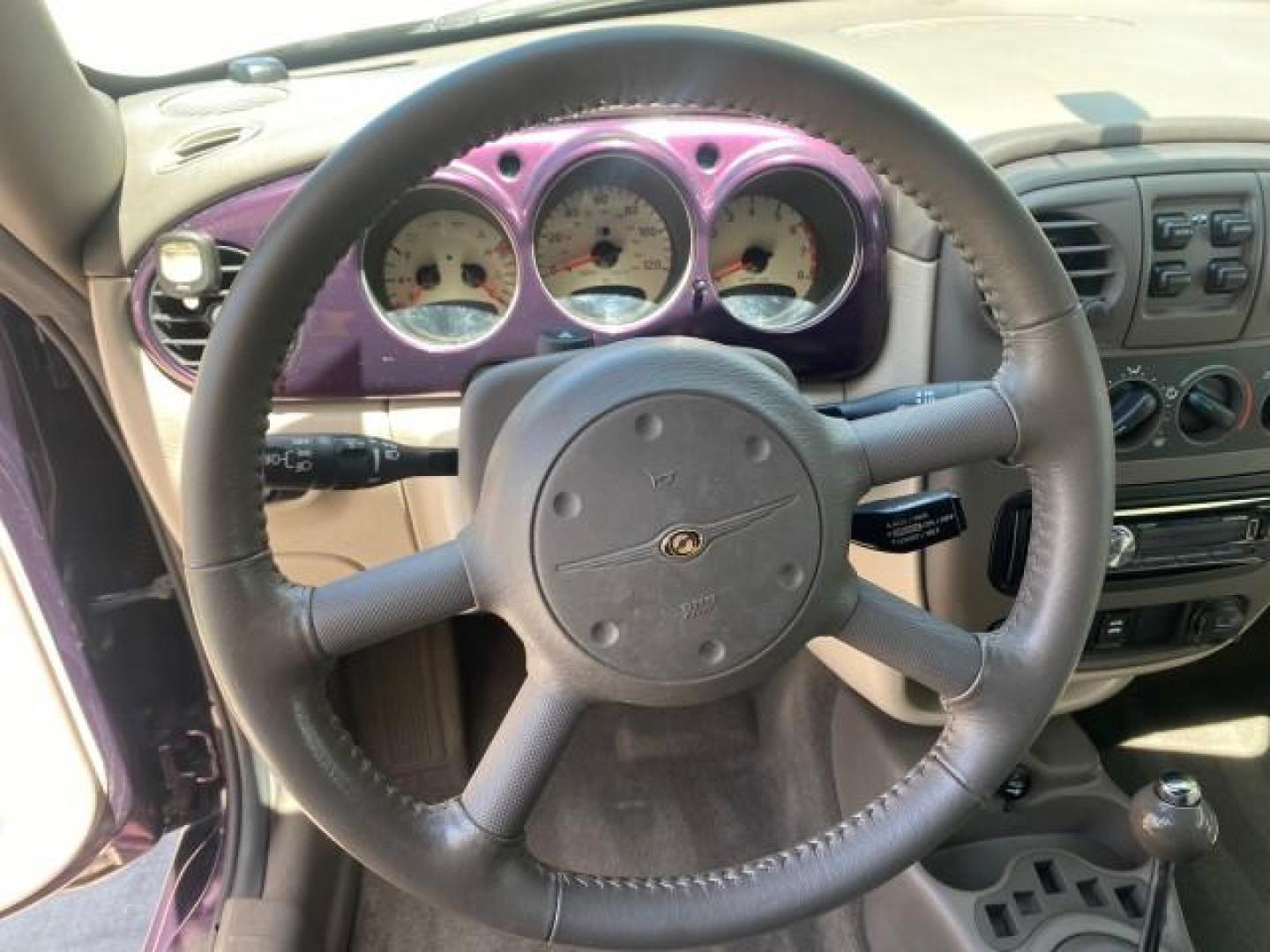 2005 Dark Plum Pearl /Taupe/Pearl Beige Chrysler PT Cruiser TURBO CONV LOW MILES 28,028 (3C3AY55E65T) with an 2.4L DOHC 16-Valve Turbo I4 Engine engine, Automatic transmission, located at 4701 North Dixie Hwy, Pompano Beach, FL, 33064, (954) 422-2889, 26.240938, -80.123474 - OUR WEBPAGE FLORIDACARS1.COM HAS OVER 100 PHOTOS AND FREE CARFAX LINK 2005 CHRYSLER PT CRUISER TOURING LEATHER LOADED VERY NICE NONSMOKER VIN: 3C3AY55E65T518675 3 C 3 A Y 5 5 E 6 5 T 5 1 8 6 7 5 CONVERTIBLE 2.4L I4 F DOHC 16V GASOLINE FRONT WHEEL DRIVE Top Features Alloy Wheels Leather Seats Satelli - Photo#39
