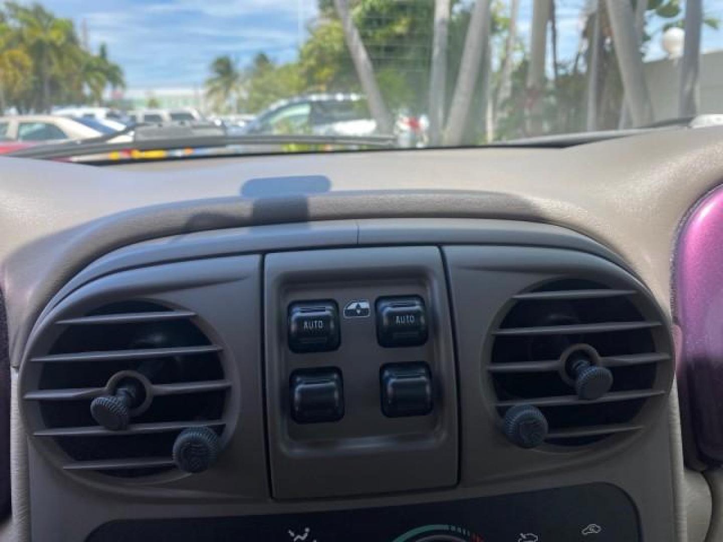 2005 Dark Plum Pearl /Taupe/Pearl Beige Chrysler PT Cruiser TURBO CONV LOW MILES 28,028 (3C3AY55E65T) with an 2.4L DOHC 16-Valve Turbo I4 Engine engine, Automatic transmission, located at 4701 North Dixie Hwy, Pompano Beach, FL, 33064, (954) 422-2889, 26.240938, -80.123474 - OUR WEBPAGE FLORIDACARS1.COM HAS OVER 100 PHOTOS AND FREE CARFAX LINK 2005 CHRYSLER PT CRUISER TOURING LEATHER LOADED VERY NICE NONSMOKER VIN: 3C3AY55E65T518675 3 C 3 A Y 5 5 E 6 5 T 5 1 8 6 7 5 CONVERTIBLE 2.4L I4 F DOHC 16V GASOLINE FRONT WHEEL DRIVE Top Features Alloy Wheels Leather Seats Satelli - Photo#46