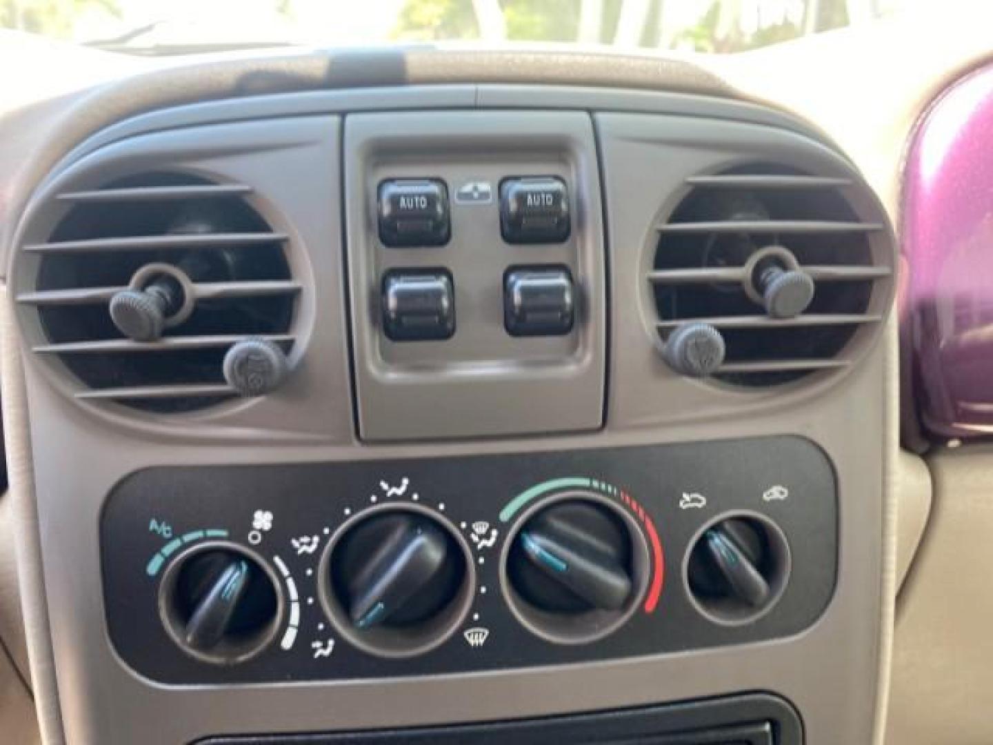 2005 Dark Plum Pearl /Taupe/Pearl Beige Chrysler PT Cruiser TURBO CONV LOW MILES 28,028 (3C3AY55E65T) with an 2.4L DOHC 16-Valve Turbo I4 Engine engine, Automatic transmission, located at 4701 North Dixie Hwy, Pompano Beach, FL, 33064, (954) 422-2889, 26.240938, -80.123474 - OUR WEBPAGE FLORIDACARS1.COM HAS OVER 100 PHOTOS AND FREE CARFAX LINK 2005 CHRYSLER PT CRUISER TOURING LEATHER LOADED VERY NICE NONSMOKER VIN: 3C3AY55E65T518675 3 C 3 A Y 5 5 E 6 5 T 5 1 8 6 7 5 CONVERTIBLE 2.4L I4 F DOHC 16V GASOLINE FRONT WHEEL DRIVE Top Features Alloy Wheels Leather Seats Satelli - Photo#47