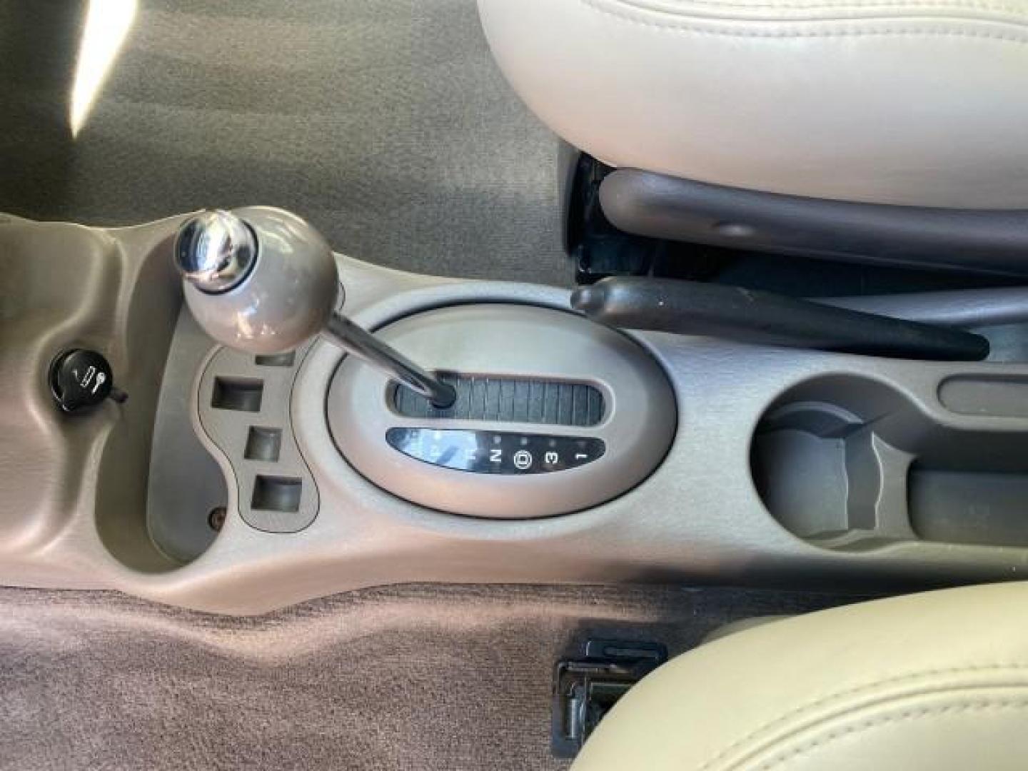 2005 Dark Plum Pearl /Taupe/Pearl Beige Chrysler PT Cruiser TURBO CONV LOW MILES 28,028 (3C3AY55E65T) with an 2.4L DOHC 16-Valve Turbo I4 Engine engine, Automatic transmission, located at 4701 North Dixie Hwy, Pompano Beach, FL, 33064, (954) 422-2889, 26.240938, -80.123474 - OUR WEBPAGE FLORIDACARS1.COM HAS OVER 100 PHOTOS AND FREE CARFAX LINK 2005 CHRYSLER PT CRUISER TOURING LEATHER LOADED VERY NICE NONSMOKER VIN: 3C3AY55E65T518675 3 C 3 A Y 5 5 E 6 5 T 5 1 8 6 7 5 CONVERTIBLE 2.4L I4 F DOHC 16V GASOLINE FRONT WHEEL DRIVE Top Features Alloy Wheels Leather Seats Satelli - Photo#51
