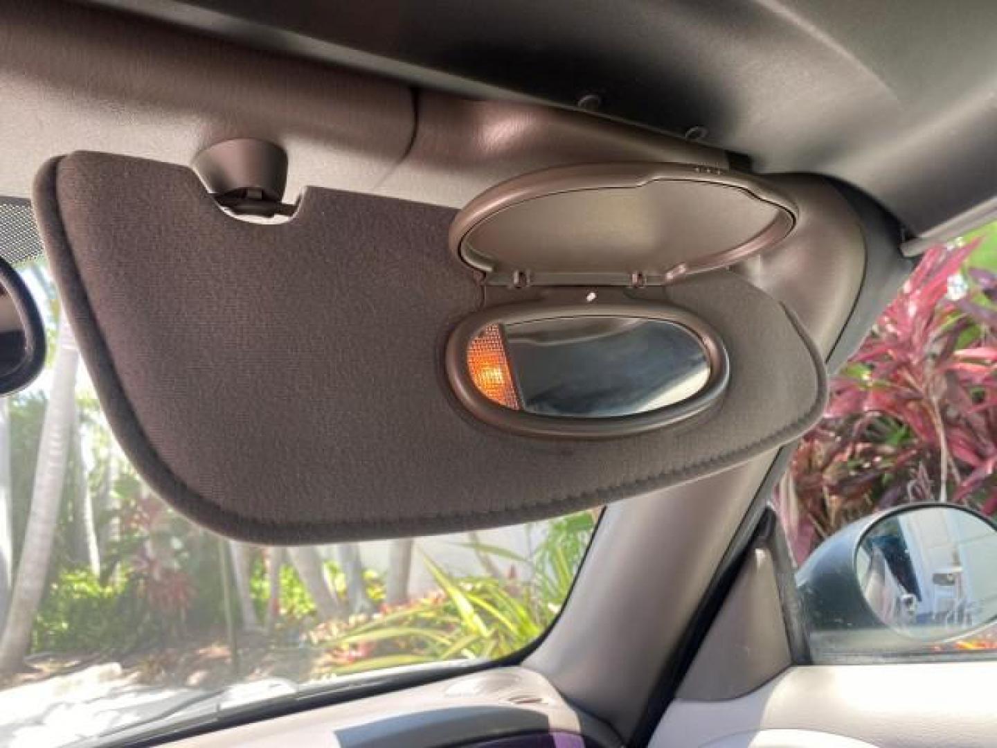 2005 Dark Plum Pearl /Taupe/Pearl Beige Chrysler PT Cruiser TURBO CONV LOW MILES 28,028 (3C3AY55E65T) with an 2.4L DOHC 16-Valve Turbo I4 Engine engine, Automatic transmission, located at 4701 North Dixie Hwy, Pompano Beach, FL, 33064, (954) 422-2889, 26.240938, -80.123474 - OUR WEBPAGE FLORIDACARS1.COM HAS OVER 100 PHOTOS AND FREE CARFAX LINK 2005 CHRYSLER PT CRUISER TOURING LEATHER LOADED VERY NICE NONSMOKER VIN: 3C3AY55E65T518675 3 C 3 A Y 5 5 E 6 5 T 5 1 8 6 7 5 CONVERTIBLE 2.4L I4 F DOHC 16V GASOLINE FRONT WHEEL DRIVE Top Features Alloy Wheels Leather Seats Satelli - Photo#57