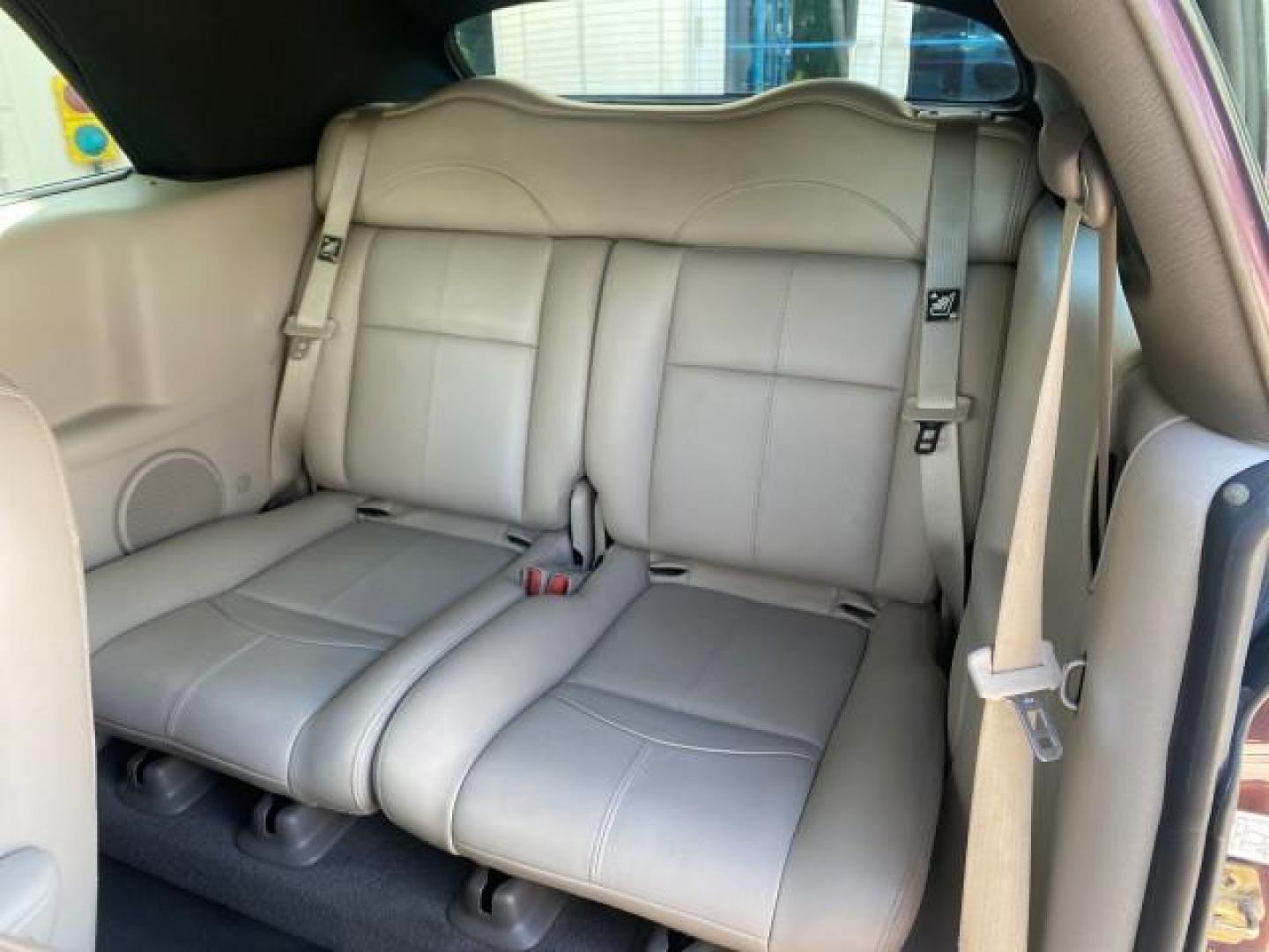 2005 Dark Plum Pearl /Taupe/Pearl Beige Chrysler PT Cruiser TURBO CONV LOW MILES 28,028 (3C3AY55E65T) with an 2.4L DOHC 16-Valve Turbo I4 Engine engine, Automatic transmission, located at 4701 North Dixie Hwy, Pompano Beach, FL, 33064, (954) 422-2889, 26.240938, -80.123474 - OUR WEBPAGE FLORIDACARS1.COM HAS OVER 100 PHOTOS AND FREE CARFAX LINK 2005 CHRYSLER PT CRUISER TOURING LEATHER LOADED VERY NICE NONSMOKER VIN: 3C3AY55E65T518675 3 C 3 A Y 5 5 E 6 5 T 5 1 8 6 7 5 CONVERTIBLE 2.4L I4 F DOHC 16V GASOLINE FRONT WHEEL DRIVE Top Features Alloy Wheels Leather Seats Satelli - Photo#60