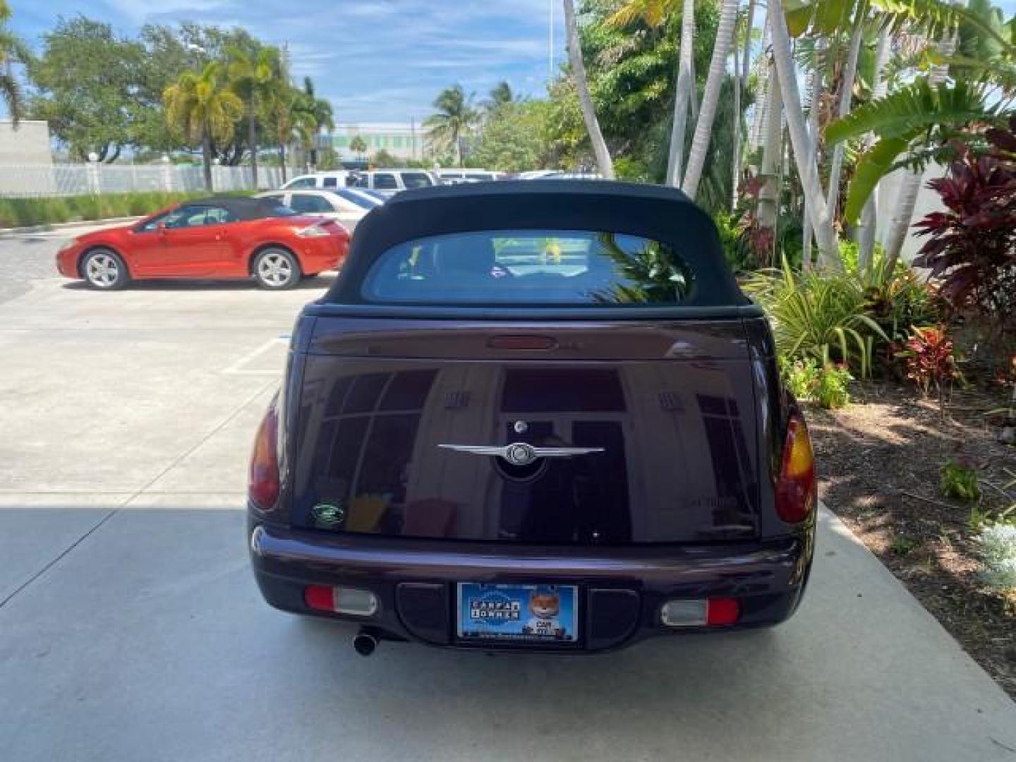 2005 Dark Plum Pearl /Taupe/Pearl Beige Chrysler PT Cruiser TURBO CONV LOW MILES 28,028 (3C3AY55E65T) with an 2.4L DOHC 16-Valve Turbo I4 Engine engine, Automatic transmission, located at 4701 North Dixie Hwy, Pompano Beach, FL, 33064, (954) 422-2889, 26.240938, -80.123474 - OUR WEBPAGE FLORIDACARS1.COM HAS OVER 100 PHOTOS AND FREE CARFAX LINK 2005 CHRYSLER PT CRUISER TOURING LEATHER LOADED VERY NICE NONSMOKER VIN: 3C3AY55E65T518675 3 C 3 A Y 5 5 E 6 5 T 5 1 8 6 7 5 CONVERTIBLE 2.4L I4 F DOHC 16V GASOLINE FRONT WHEEL DRIVE Top Features Alloy Wheels Leather Seats Satelli - Photo#67