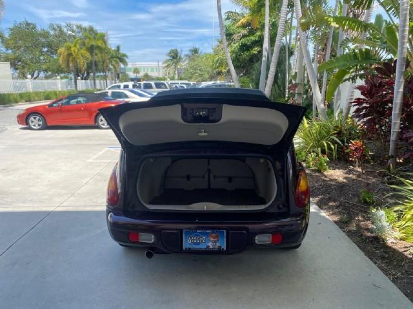 2005 Dark Plum Pearl /Taupe/Pearl Beige Chrysler PT Cruiser TURBO CONV LOW MILES 28,028 (3C3AY55E65T) with an 2.4L DOHC 16-Valve Turbo I4 Engine engine, Automatic transmission, located at 4701 North Dixie Hwy, Pompano Beach, FL, 33064, (954) 422-2889, 26.240938, -80.123474 - OUR WEBPAGE FLORIDACARS1.COM HAS OVER 100 PHOTOS AND FREE CARFAX LINK 2005 CHRYSLER PT CRUISER TOURING LEATHER LOADED VERY NICE NONSMOKER VIN: 3C3AY55E65T518675 3 C 3 A Y 5 5 E 6 5 T 5 1 8 6 7 5 CONVERTIBLE 2.4L I4 F DOHC 16V GASOLINE FRONT WHEEL DRIVE Top Features Alloy Wheels Leather Seats Satelli - Photo#71