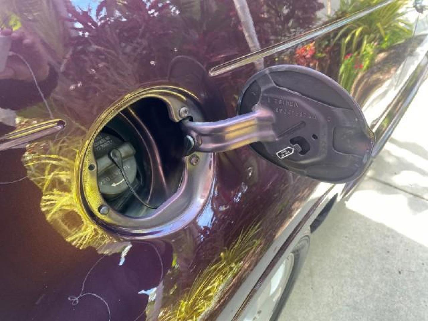 2005 Dark Plum Pearl /Taupe/Pearl Beige Chrysler PT Cruiser TURBO CONV LOW MILES 28,028 (3C3AY55E65T) with an 2.4L DOHC 16-Valve Turbo I4 Engine engine, Automatic transmission, located at 4701 North Dixie Hwy, Pompano Beach, FL, 33064, (954) 422-2889, 26.240938, -80.123474 - OUR WEBPAGE FLORIDACARS1.COM HAS OVER 100 PHOTOS AND FREE CARFAX LINK 2005 CHRYSLER PT CRUISER TOURING LEATHER LOADED VERY NICE NONSMOKER VIN: 3C3AY55E65T518675 3 C 3 A Y 5 5 E 6 5 T 5 1 8 6 7 5 CONVERTIBLE 2.4L I4 F DOHC 16V GASOLINE FRONT WHEEL DRIVE Top Features Alloy Wheels Leather Seats Satelli - Photo#76