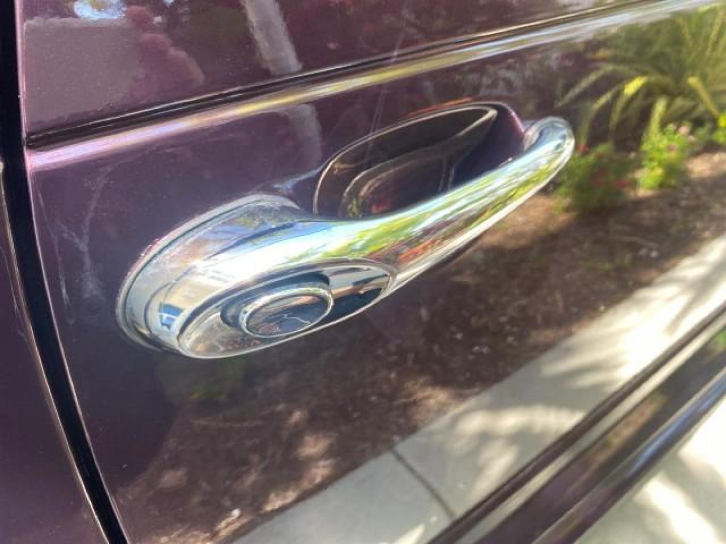 2005 Dark Plum Pearl /Taupe/Pearl Beige Chrysler PT Cruiser TURBO CONV LOW MILES 28,028 (3C3AY55E65T) with an 2.4L DOHC 16-Valve Turbo I4 Engine engine, Automatic transmission, located at 4701 North Dixie Hwy, Pompano Beach, FL, 33064, (954) 422-2889, 26.240938, -80.123474 - OUR WEBPAGE FLORIDACARS1.COM HAS OVER 100 PHOTOS AND FREE CARFAX LINK 2005 CHRYSLER PT CRUISER TOURING LEATHER LOADED VERY NICE NONSMOKER VIN: 3C3AY55E65T518675 3 C 3 A Y 5 5 E 6 5 T 5 1 8 6 7 5 CONVERTIBLE 2.4L I4 F DOHC 16V GASOLINE FRONT WHEEL DRIVE Top Features Alloy Wheels Leather Seats Satelli - Photo#80