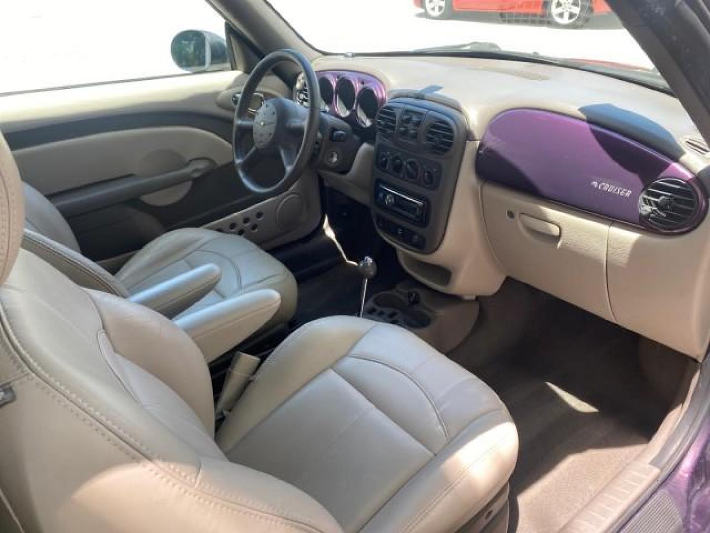 2005 Dark Plum Pearl /Taupe/Pearl Beige Chrysler PT Cruiser TURBO CONV LOW MILES 28,028 (3C3AY55E65T) with an 2.4L DOHC 16-Valve Turbo I4 Engine engine, Automatic transmission, located at 4701 North Dixie Hwy, Pompano Beach, FL, 33064, (954) 422-2889, 26.240938, -80.123474 - OUR WEBPAGE FLORIDACARS1.COM HAS OVER 100 PHOTOS AND FREE CARFAX LINK 2005 CHRYSLER PT CRUISER TOURING LEATHER LOADED VERY NICE NONSMOKER VIN: 3C3AY55E65T518675 3 C 3 A Y 5 5 E 6 5 T 5 1 8 6 7 5 CONVERTIBLE 2.4L I4 F DOHC 16V GASOLINE FRONT WHEEL DRIVE Top Features Alloy Wheels Leather Seats Satelli - Photo#86