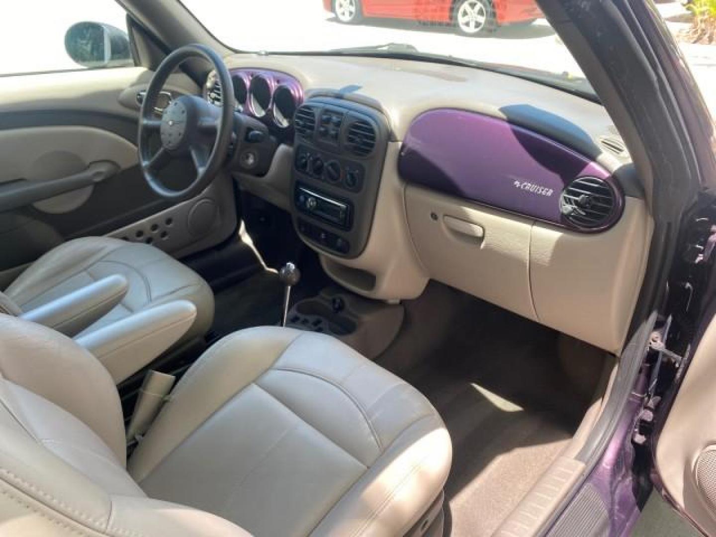 2005 Dark Plum Pearl /Taupe/Pearl Beige Chrysler PT Cruiser TURBO CONV LOW MILES 28,028 (3C3AY55E65T) with an 2.4L DOHC 16-Valve Turbo I4 Engine engine, Automatic transmission, located at 4701 North Dixie Hwy, Pompano Beach, FL, 33064, (954) 422-2889, 26.240938, -80.123474 - OUR WEBPAGE FLORIDACARS1.COM HAS OVER 100 PHOTOS AND FREE CARFAX LINK 2005 CHRYSLER PT CRUISER TOURING LEATHER LOADED VERY NICE NONSMOKER VIN: 3C3AY55E65T518675 3 C 3 A Y 5 5 E 6 5 T 5 1 8 6 7 5 CONVERTIBLE 2.4L I4 F DOHC 16V GASOLINE FRONT WHEEL DRIVE Top Features Alloy Wheels Leather Seats Satelli - Photo#87