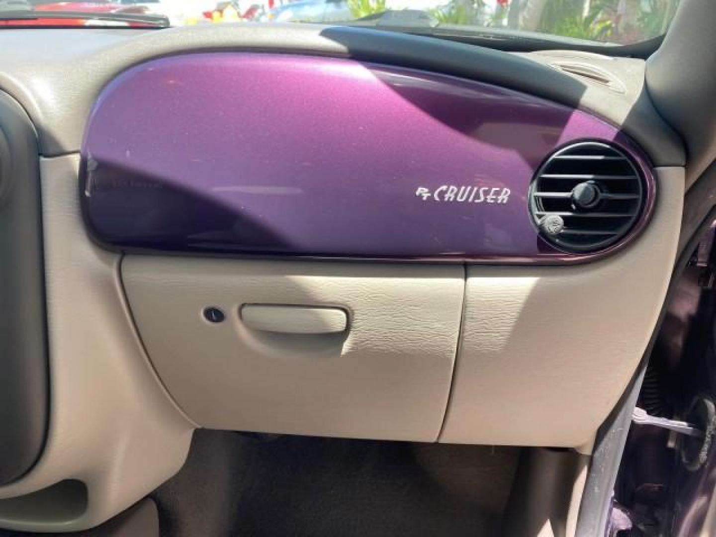 2005 Dark Plum Pearl /Taupe/Pearl Beige Chrysler PT Cruiser TURBO CONV LOW MILES 28,028 (3C3AY55E65T) with an 2.4L DOHC 16-Valve Turbo I4 Engine engine, Automatic transmission, located at 4701 North Dixie Hwy, Pompano Beach, FL, 33064, (954) 422-2889, 26.240938, -80.123474 - OUR WEBPAGE FLORIDACARS1.COM HAS OVER 100 PHOTOS AND FREE CARFAX LINK 2005 CHRYSLER PT CRUISER TOURING LEATHER LOADED VERY NICE NONSMOKER VIN: 3C3AY55E65T518675 3 C 3 A Y 5 5 E 6 5 T 5 1 8 6 7 5 CONVERTIBLE 2.4L I4 F DOHC 16V GASOLINE FRONT WHEEL DRIVE Top Features Alloy Wheels Leather Seats Satelli - Photo#88