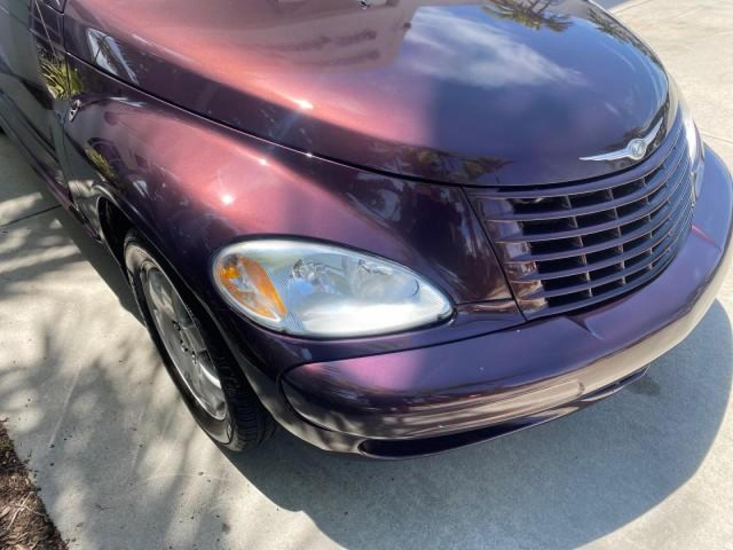 2005 Dark Plum Pearl /Taupe/Pearl Beige Chrysler PT Cruiser TURBO CONV LOW MILES 28,028 (3C3AY55E65T) with an 2.4L DOHC 16-Valve Turbo I4 Engine engine, Automatic transmission, located at 4701 North Dixie Hwy, Pompano Beach, FL, 33064, (954) 422-2889, 26.240938, -80.123474 - OUR WEBPAGE FLORIDACARS1.COM HAS OVER 100 PHOTOS AND FREE CARFAX LINK 2005 CHRYSLER PT CRUISER TOURING LEATHER LOADED VERY NICE NONSMOKER VIN: 3C3AY55E65T518675 3 C 3 A Y 5 5 E 6 5 T 5 1 8 6 7 5 CONVERTIBLE 2.4L I4 F DOHC 16V GASOLINE FRONT WHEEL DRIVE Top Features Alloy Wheels Leather Seats Satelli - Photo#96