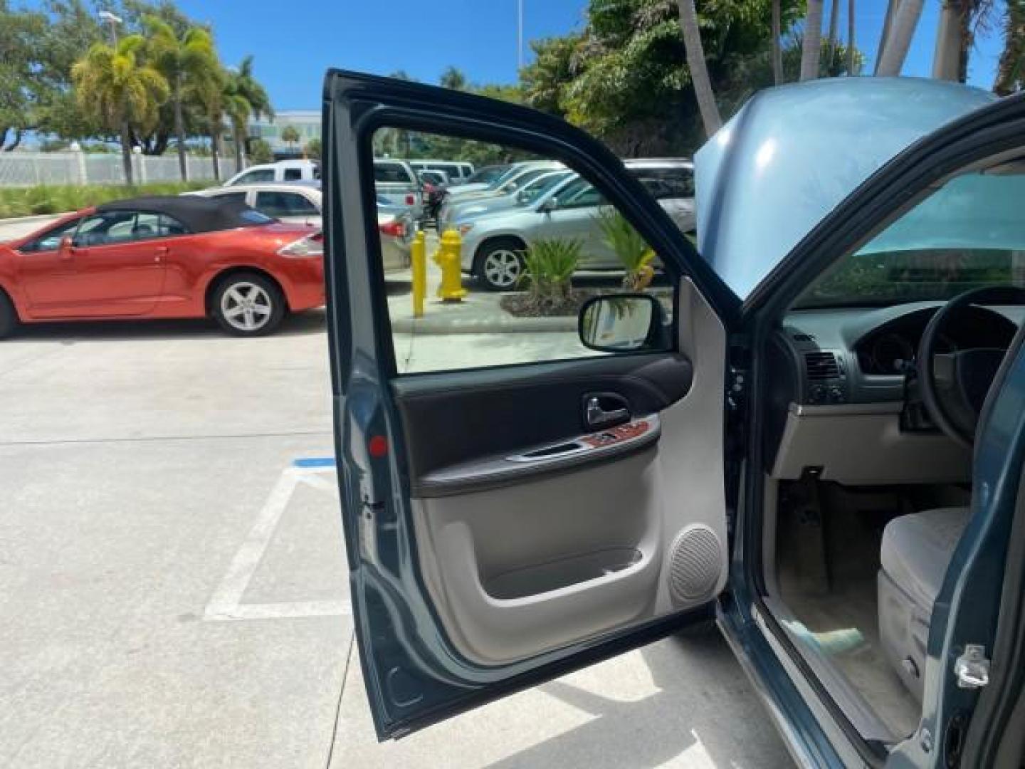 2007 Blue Granite Metallic /Medium Gray Chevrolet Uplander LS LOW MILES 70,368 (1GNDV23177D) with an 3.9L V6 SFI Engine engine, Automatic transmission, located at 4701 North Dixie Hwy, Pompano Beach, FL, 33064, (954) 422-2889, 26.240938, -80.123474 - OUR WEBPAGE FLORIDACARS1.COM HAS OVER 100 PHOTOS AND FREE CARFAX LINK 2007 CHEVROLET UPLANDER LS VIN: 1GNDV23177D130452 1 G N D V 2 3 1 7 7 D 1 3 0 4 5 2 VAN 3.9L V6 F GASOLINE FRONT WHEEL DRIVE Top Features Cloth Seats Third Row Seat Basic Features ABS Brakes AM/FM Stereo Air Conditioning Automatic - Photo#9