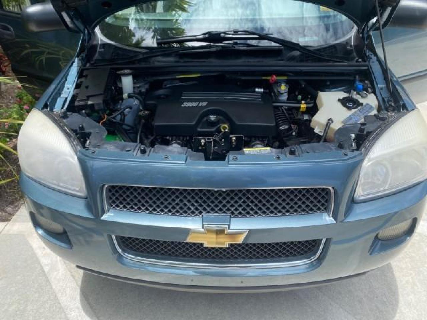 2007 Blue Granite Metallic /Medium Gray Chevrolet Uplander LS LOW MILES 70,368 (1GNDV23177D) with an 3.9L V6 SFI Engine engine, Automatic transmission, located at 4701 North Dixie Hwy, Pompano Beach, FL, 33064, (954) 422-2889, 26.240938, -80.123474 - OUR WEBPAGE FLORIDACARS1.COM HAS OVER 100 PHOTOS AND FREE CARFAX LINK 2007 CHEVROLET UPLANDER LS VIN: 1GNDV23177D130452 1 G N D V 2 3 1 7 7 D 1 3 0 4 5 2 VAN 3.9L V6 F GASOLINE FRONT WHEEL DRIVE Top Features Cloth Seats Third Row Seat Basic Features ABS Brakes AM/FM Stereo Air Conditioning Automatic - Photo#17