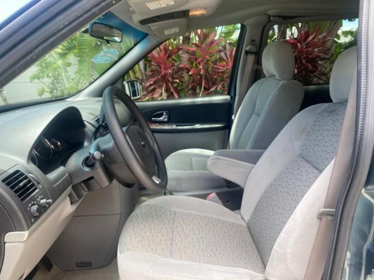2007 Blue Granite Metallic /Medium Gray Chevrolet Uplander LS LOW MILES 70,368 (1GNDV23177D) with an 3.9L V6 SFI Engine engine, Automatic transmission, located at 4701 North Dixie Hwy, Pompano Beach, FL, 33064, (954) 422-2889, 26.240938, -80.123474 - OUR WEBPAGE FLORIDACARS1.COM HAS OVER 100 PHOTOS AND FREE CARFAX LINK 2007 CHEVROLET UPLANDER LS VIN: 1GNDV23177D130452 1 G N D V 2 3 1 7 7 D 1 3 0 4 5 2 VAN 3.9L V6 F GASOLINE FRONT WHEEL DRIVE Top Features Cloth Seats Third Row Seat Basic Features ABS Brakes AM/FM Stereo Air Conditioning Automatic - Photo#33